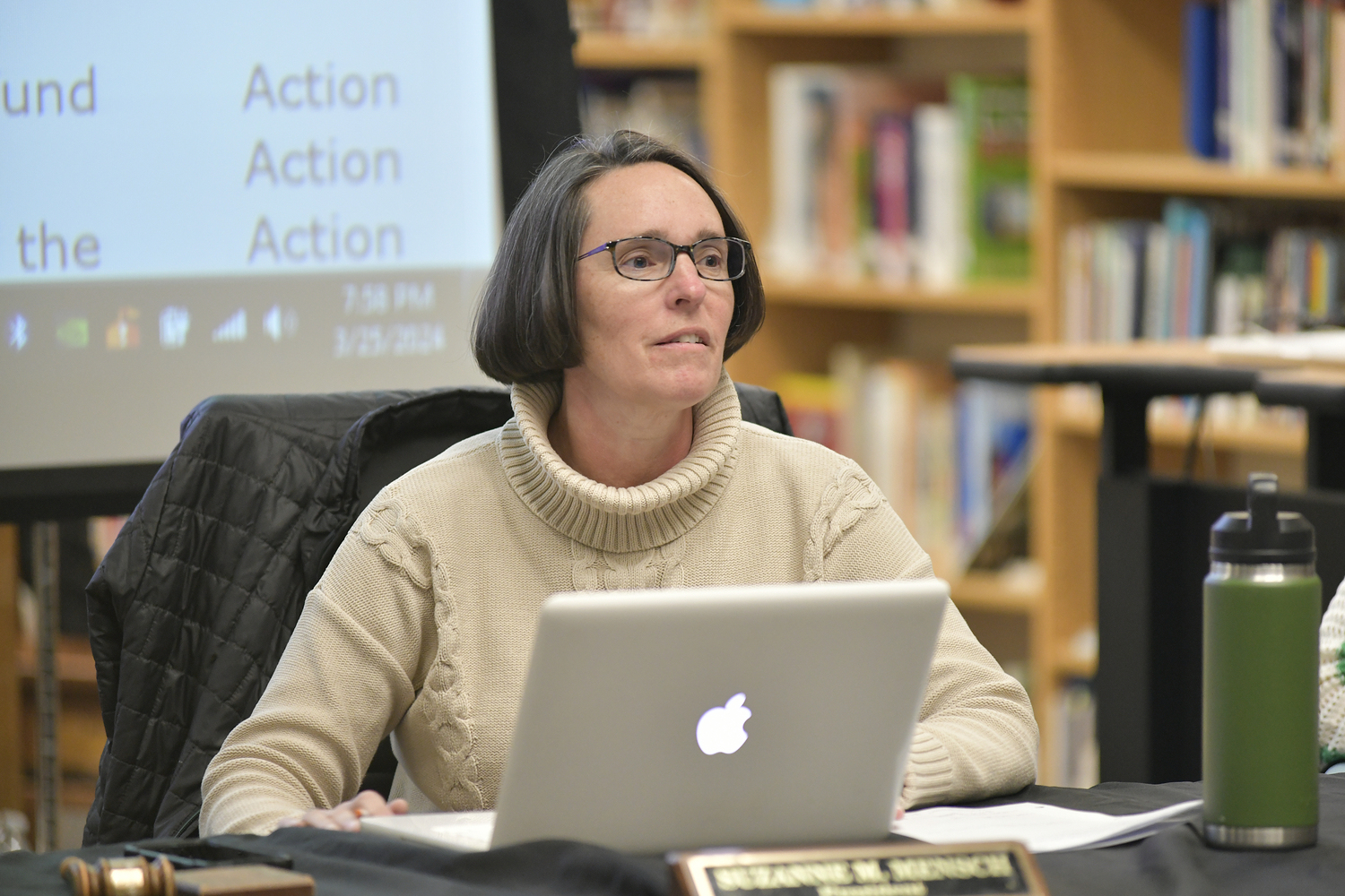 Westhampton Beach Board of Education President Suzanne Mensch fields a question at Monday night's meeting.  DANA SHAW