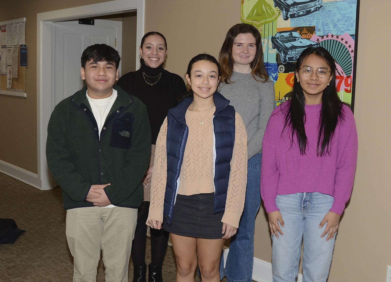 The East Hampton Level Playing Field Foundation recently announced its 2024 Scholarship Winners. Left to right are: Caleb Buestan, Maya Taveras, Jocelyn Garcia, Riley Reville and Angie Castillo.  KYRIL BROMLEY
