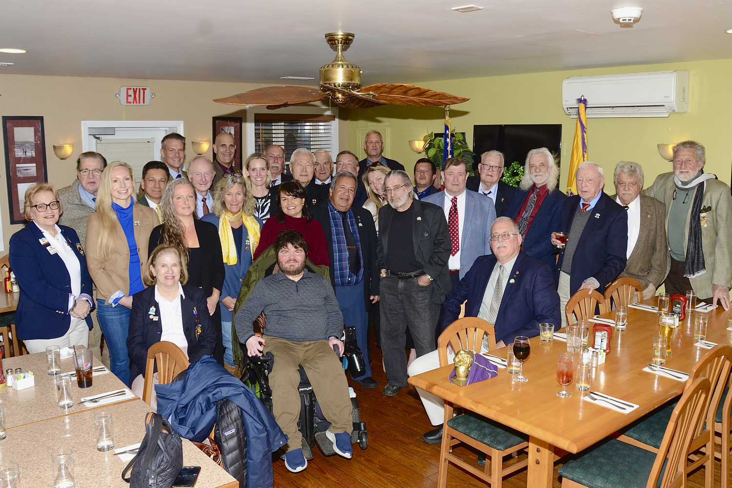 After a seven year hiatus of yearly joint meetings the Montauk Point Lions Club hosted the East Hampton Lions Club at a meeting on March 22at Sammy’s Restaurant in Montauk to celebrate 75 years of service by both clubs to the local community. Montauk Lion Tom Dess was the master of ceremonies.  He recognized that a joint meeting had not occurred in some time, but that Lions are united in their goal to serve the community with a focus on health and sight. He also acknowledged that it was International Woman’s Month, and recognized Lions at the meeting who have and still serve in the East Hampton Lions Club in leadership positions for over a decade, including Rachel Lys, Kelly White, Amber Talmage, Alice Cooley, and Tina Piette.  Included in that recognition was Lisa Valcich, the second woman in the Montauk Club to be admitted since it was chartered 75 years ago.  KYRIL BROMLEY