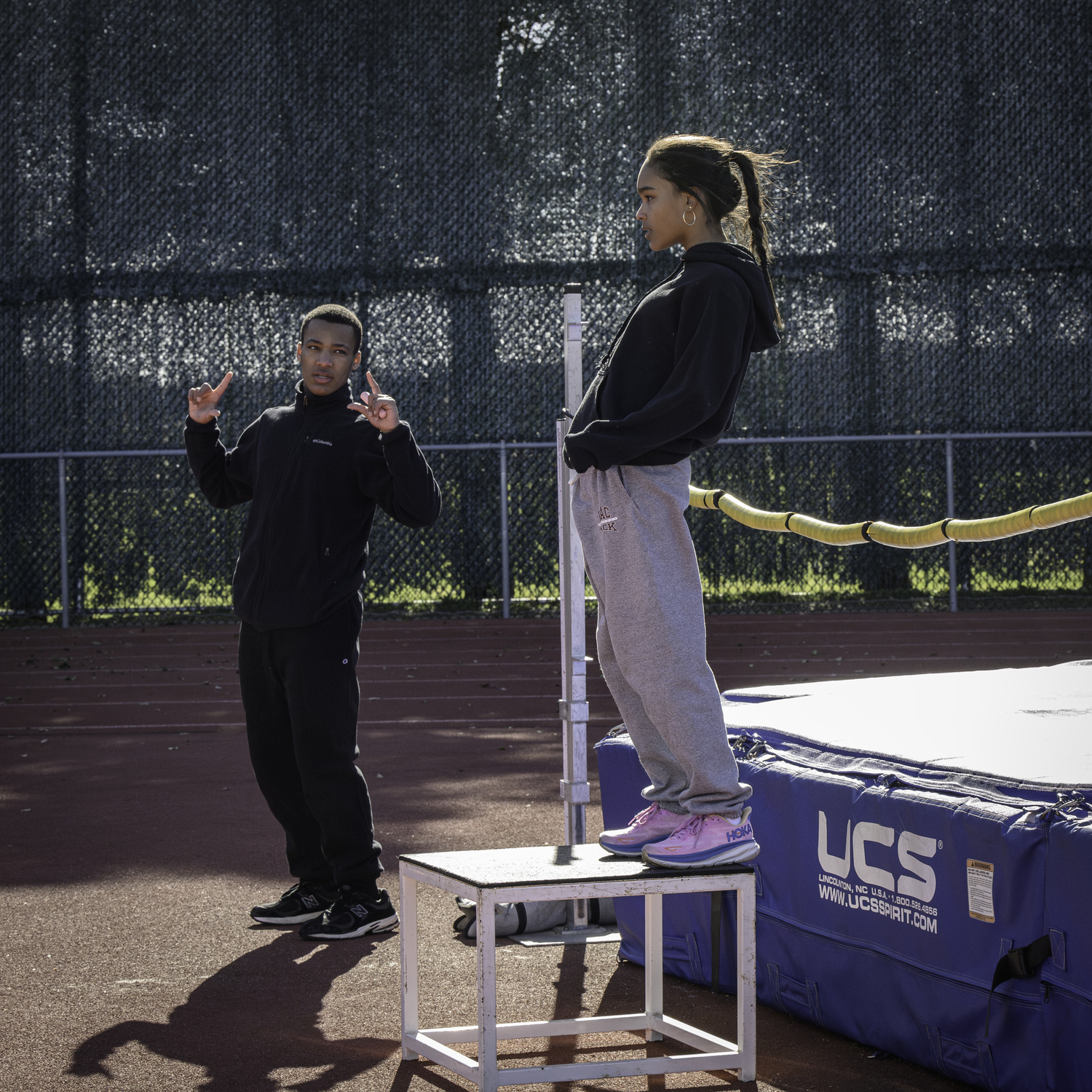 Mikhail Feaster gives some tips on performing the high jump.   MARIANNE BARNETT