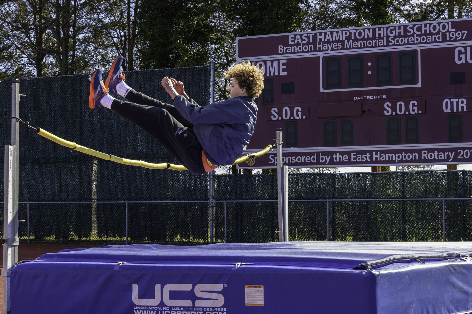 Miles Menu practices the high jump during practice on Thursday, March 21.  MARIANNE BARNETT
