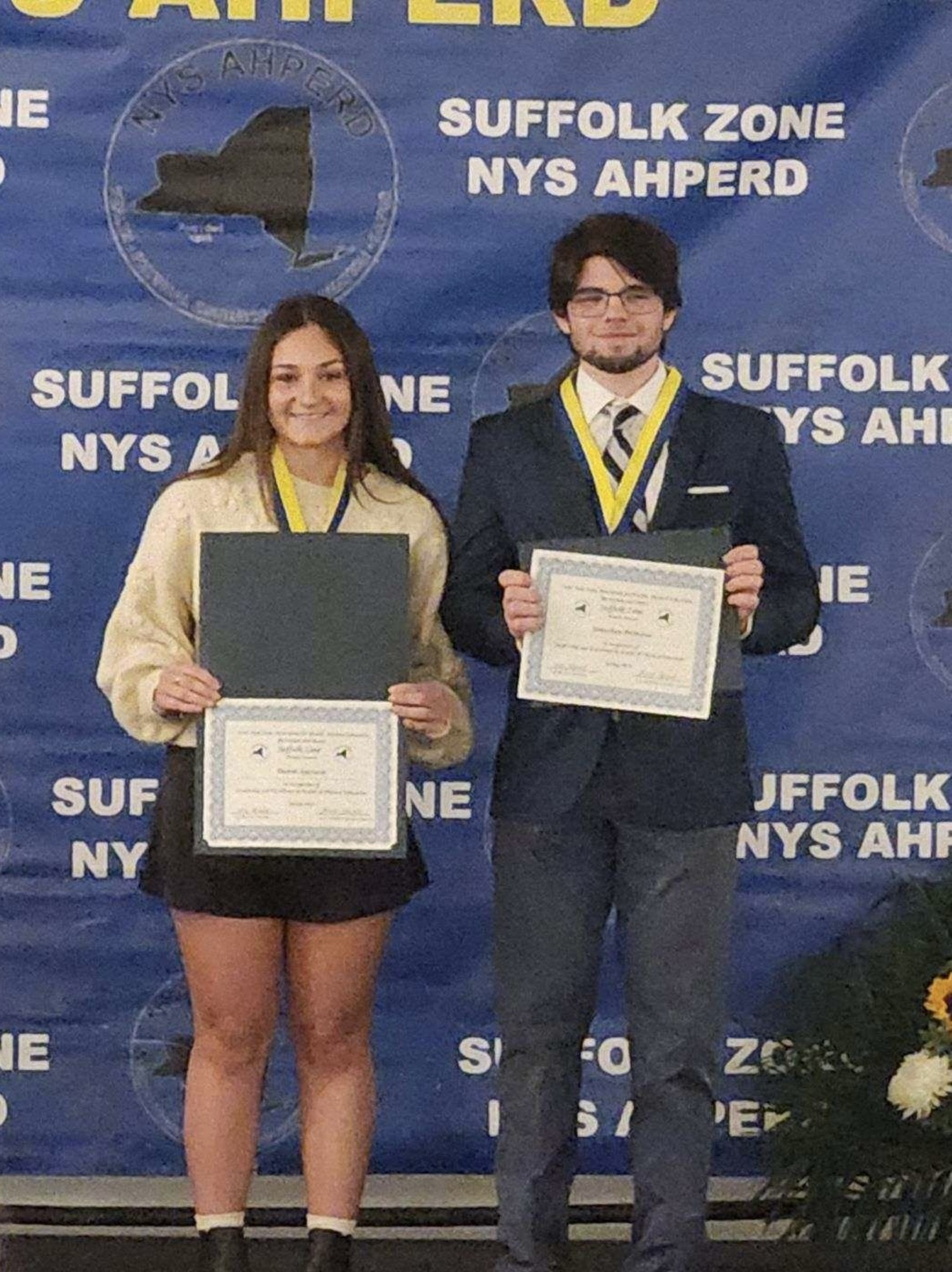 Eastport-South Manor Jr.-Sr. High School seniors Jonathan DiMarcco and Danni Sparacio received the 2024 NYS AHPERD Suffolk Zone Award. Sponsored by the New York State Association for Health, Physical Education, Recreation and Dance, the award recognizes one male and one female Suffolk County high school senior from each school district who exemplifies outstanding scholastic ability, physical education performance and leadership qualities. COURTESY EASTPORT-SOUTH MANOR SCHOOL DISTRICT