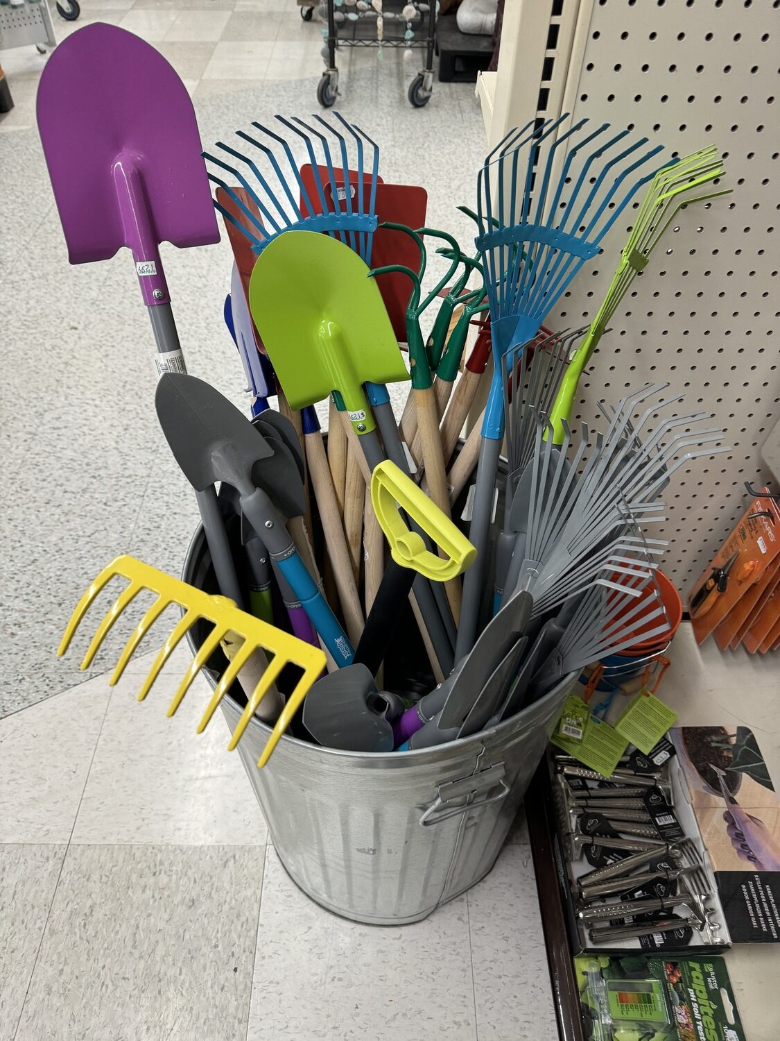 These kids' tools are for the younger children, say 4 to 6 years old, but I’d never give a young child a rake like the yellow one or a tine cultivator (green right of center) unless you are directly supervising and watching.
ANDREW MESSINGER