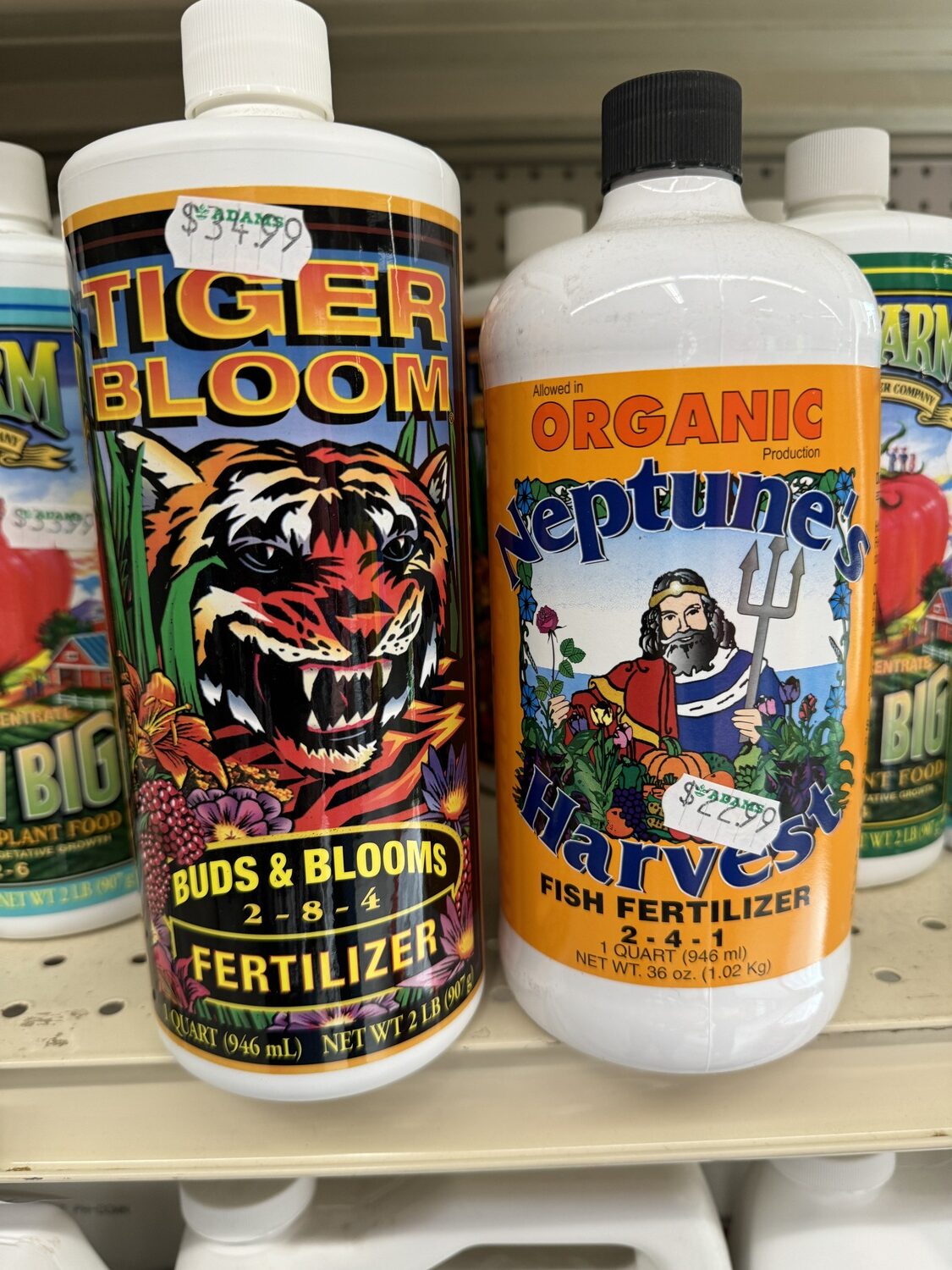 Just looking at the label you might think that Tiger Bloom on the left is organic. It isn’t.The Neptune’s Harvest on the right, however, is organic and less expensive but it has less phosphorus (4%) which may be a consideration for some gardening applications.  ANDREW MESSINGER