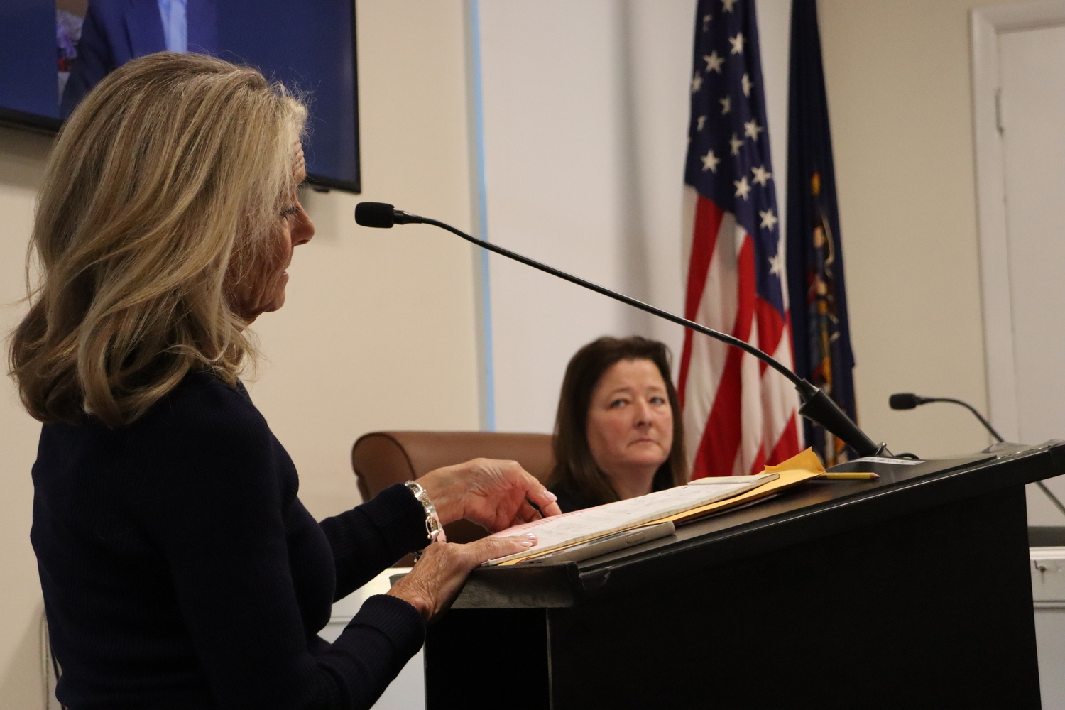 Attorney John Bennett speaking during a public hearing on updates to the village code related to pickleball and padel courts, as Southampton Village attorney Eileen Powers looks on.  CAILIN RILEY