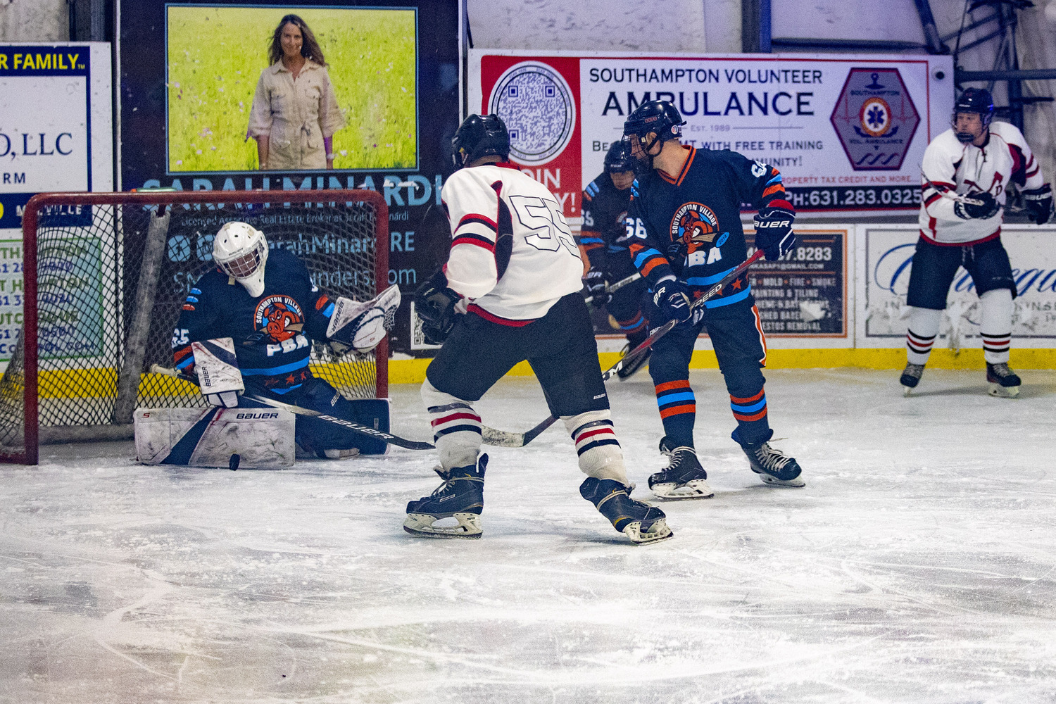 Southampton Ice Rink hosted the annual Battle of the Badges hockey game between the Southampton Fire Department and Southampton Village Police Department on Sunday evening. Proceeds went to the winning team's charity of choice. The police defeated the firefighters, 10-8.    MICHAEL O'CONNOR