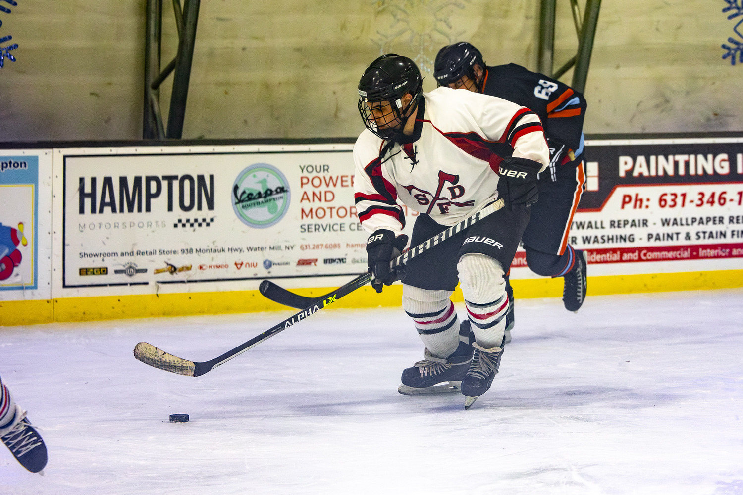 Southampton Ice Rink hosted the annual Battle of the Badges hockey game between the Southampton Fire Department and Southampton Village Police Department on Sunday evening. Proceeds went to the winning team's charity of choice. The police defeated the firefighters, 10-8.    MICHAEL O'CONNOR