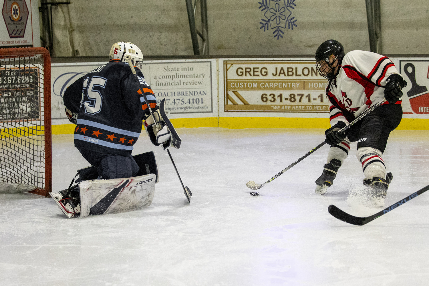 Southampton Ice Rink hosted the annual Battle of the Badges hockey game between the Southampton Fire Department and Southampton Village Police Department on Sunday evening. Proceeds went to the winning team's charity of choice. The police defeated the firefighters, 10-8.    MICHAEL O'CONNOR