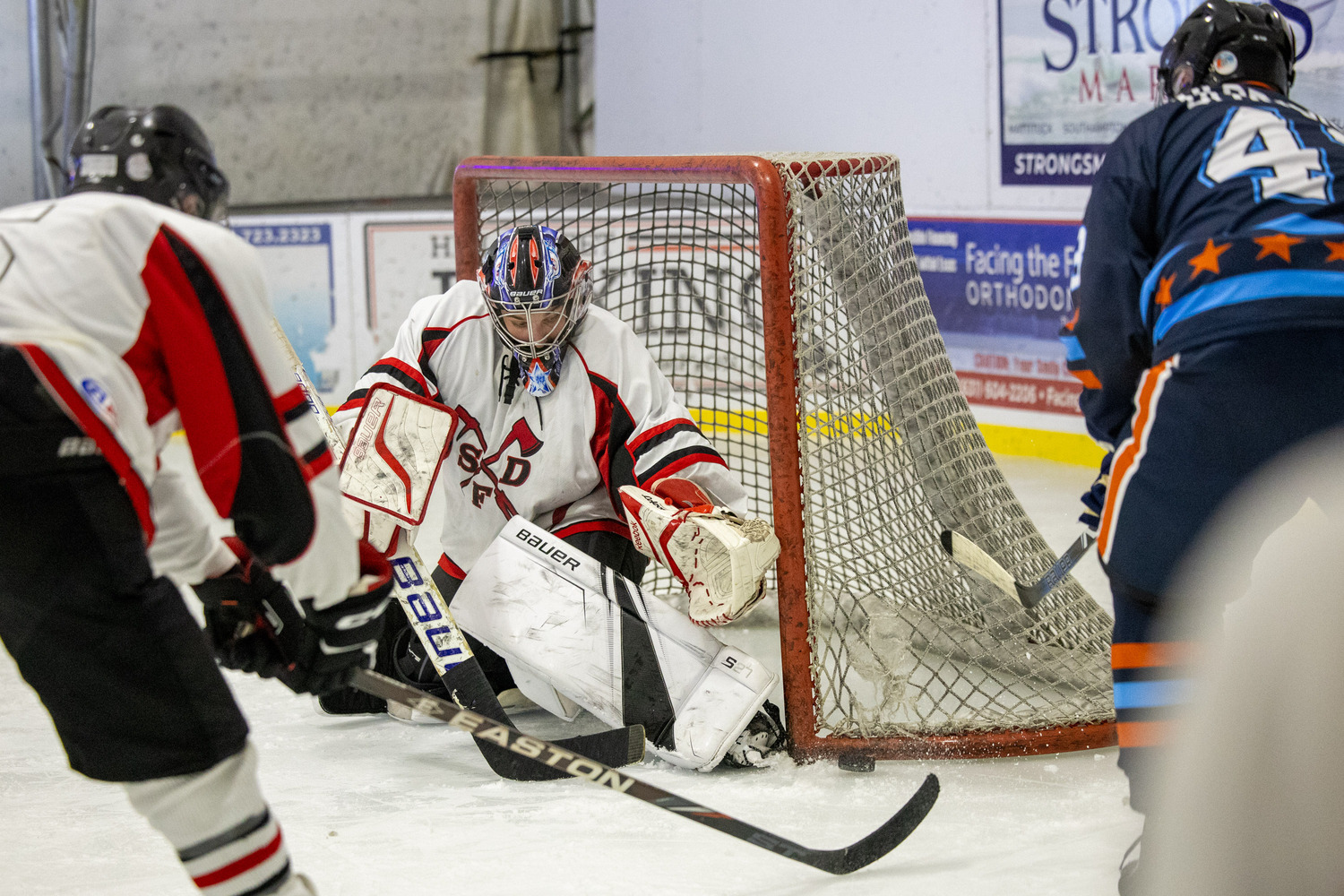 Southampton Ice Rink hosted the annual Battle of the Badges hockey game between the Southampton Fire Department and Southampton Village Police Department on Sunday evening. Proceeds went to the winning team's charity of choice. The police defeated the firefighters, 10-8.    MICHAEL O'CONNOR