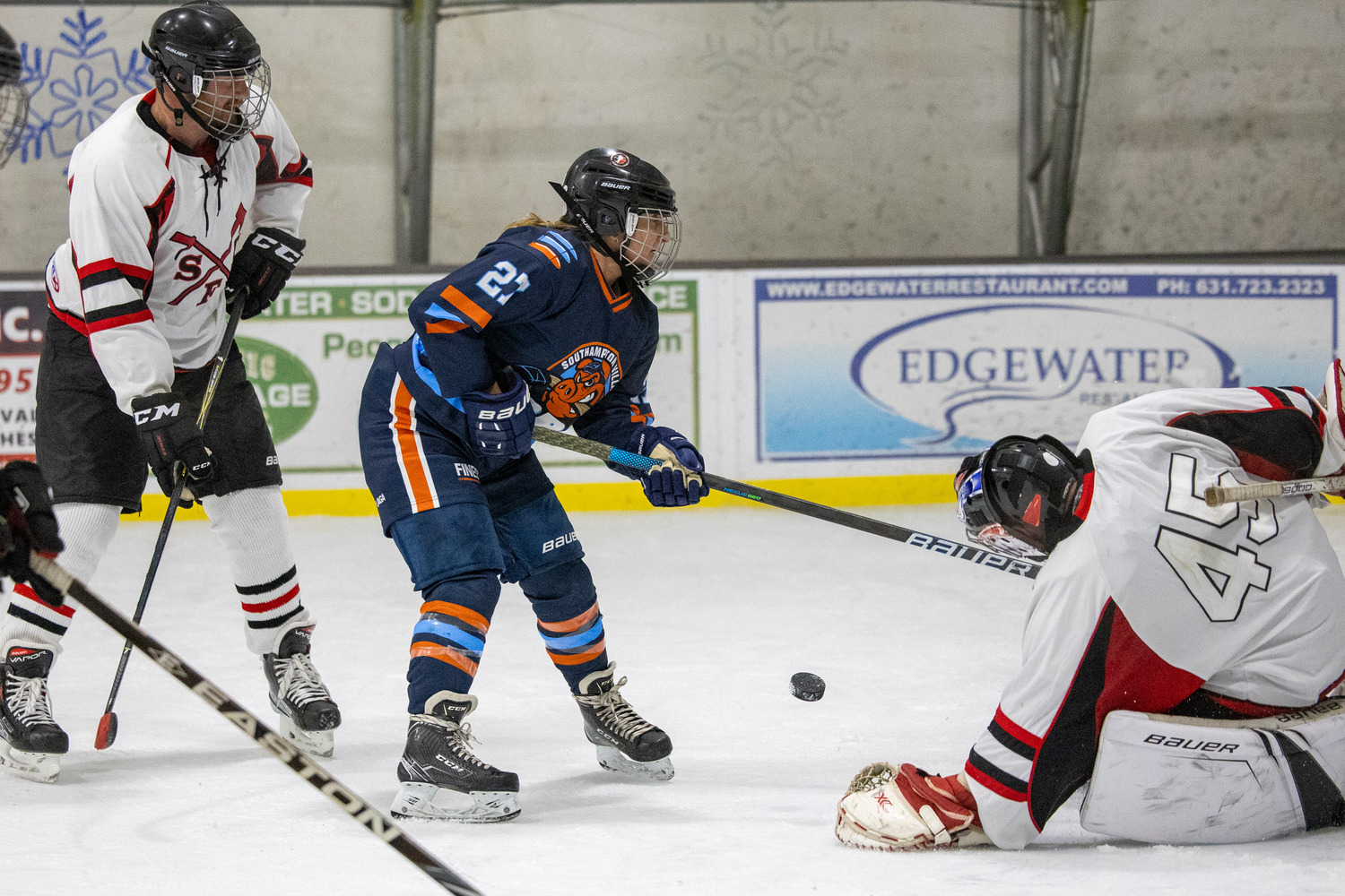 Southampton Ice Rink hosted the annual Battle of the Badges hockey game between the Southampton Fire Department and Southampton Village Police Department on Sunday evening. Proceeds went to the winning team's charity of choice. The police defeated the firefighters, 10-8.    MICHAEL O'CONNOR