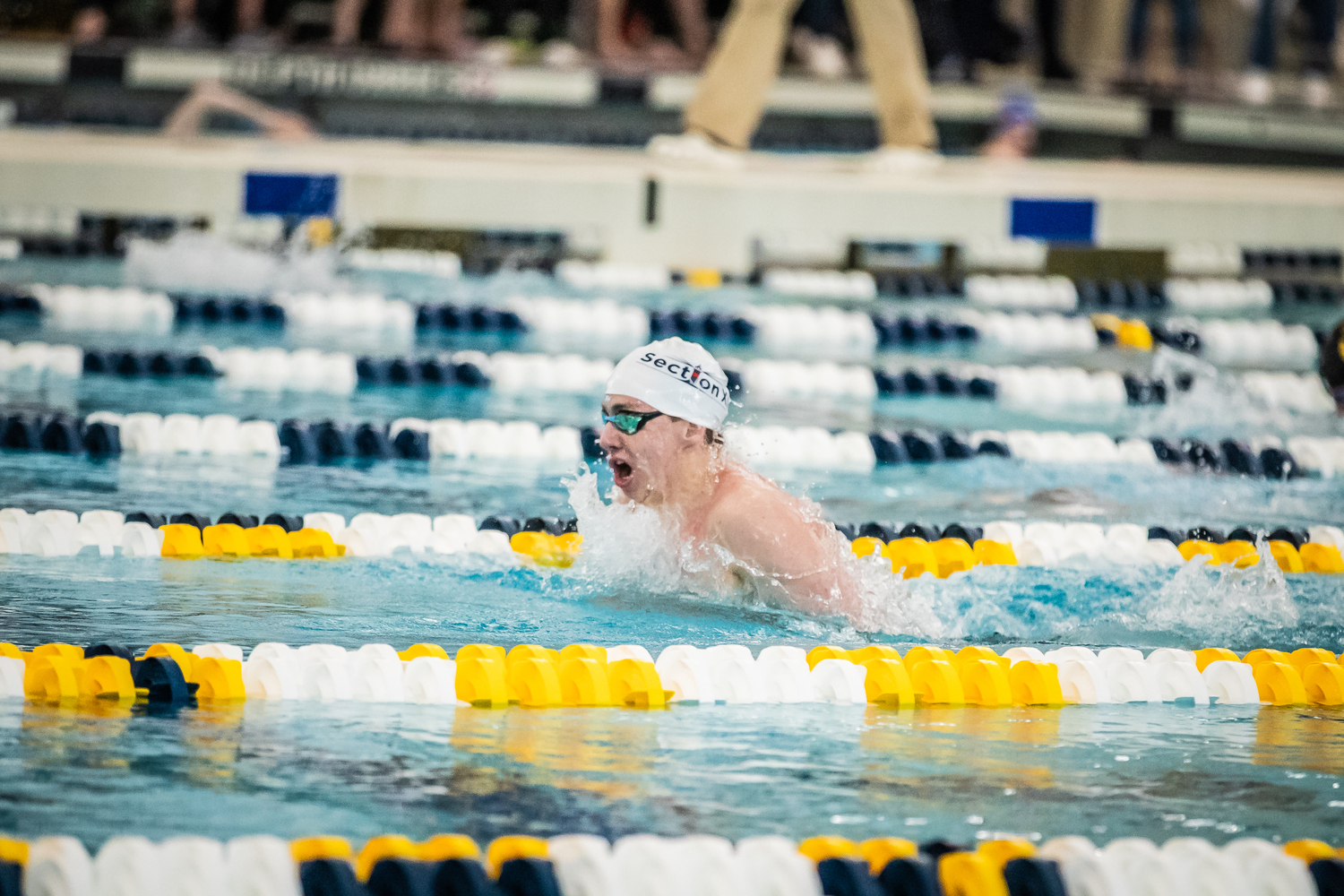 Westhampton Beach senior Max Buchen earned All-American status with his first-place finish in the 100-yard breaststroke at the New York State Swimming and Diving Championships at Cornell University March 2. DAVID WILLIAMS/BEYOND THE PRINT