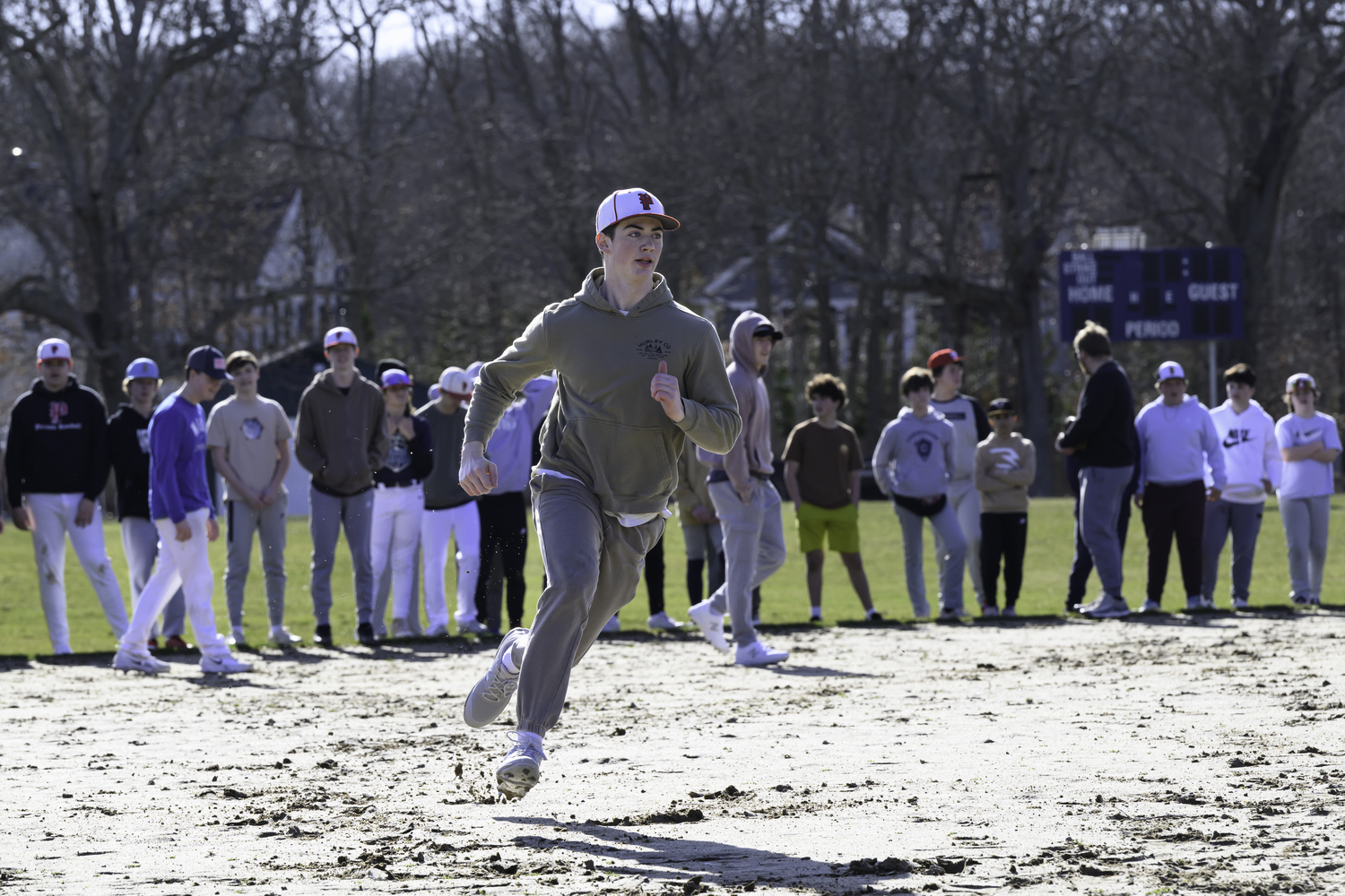 Nathan Dee runs the bases on the first day of practice on March 11.   MARIANNE BARNETT