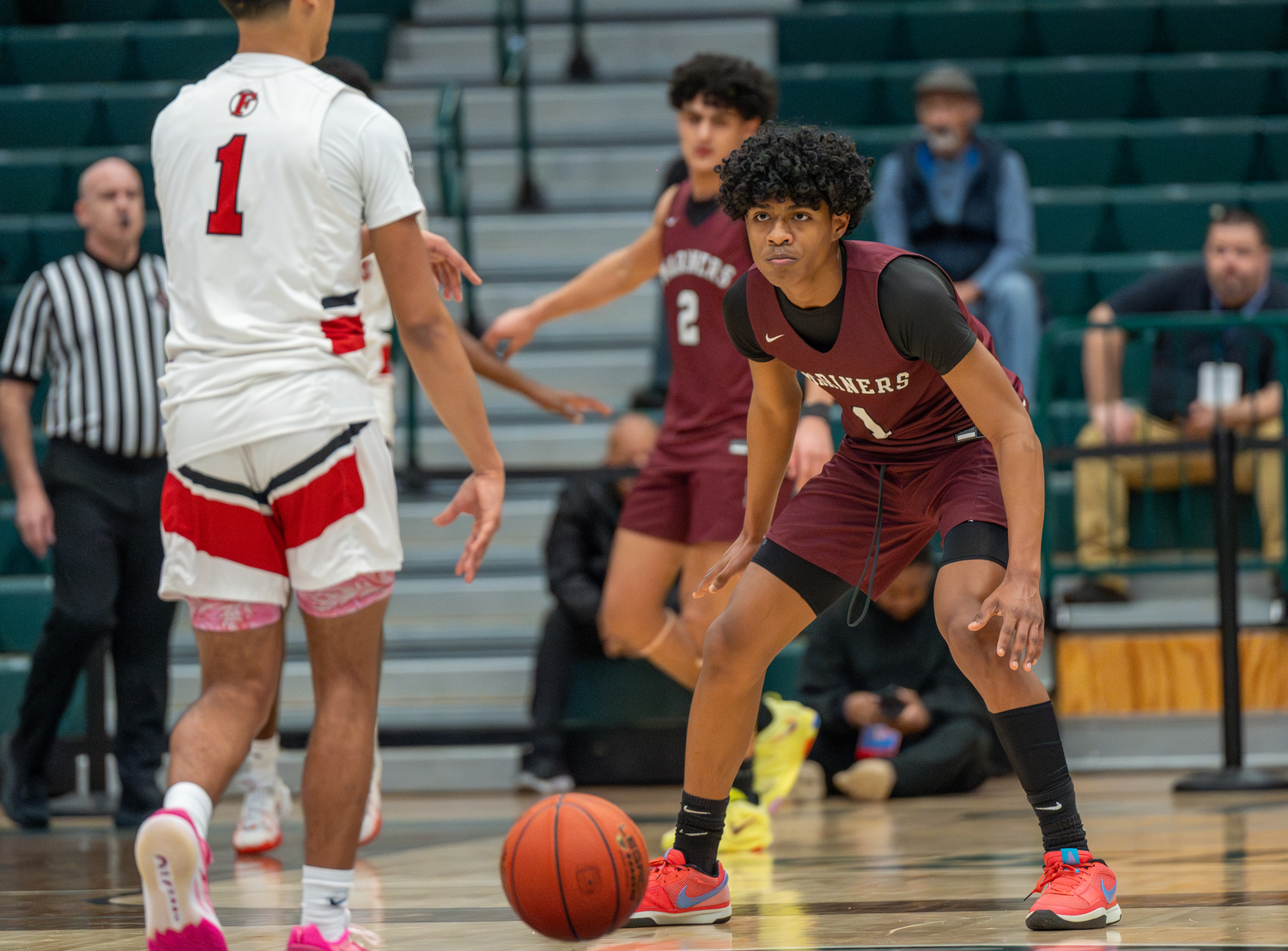 Southampton senior Dominick White keeps his eyes focused on Friends Academy freshman Eyan Valadez.   RON ESPOSITO
