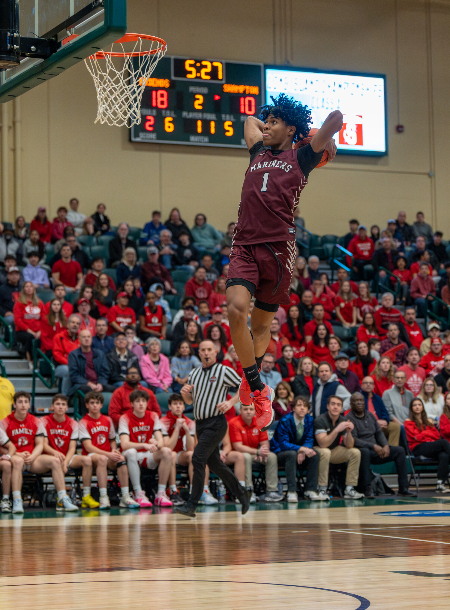 Dominick White rears back and glides in for a two-handed dunk. The senior tied with Friends Academy senior Jackson O'Brien with a game-high 18 points in Saturday's Class A Long Island Championship.   RON ESPOSITO