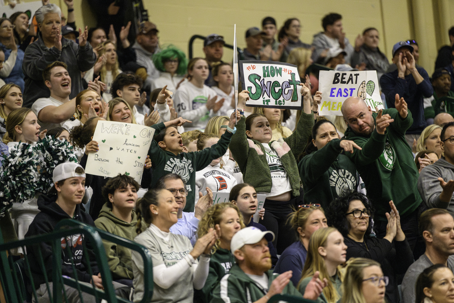 Fans cheer on the Westhampton Beach girls basketball team. MARIANNE BARNETT