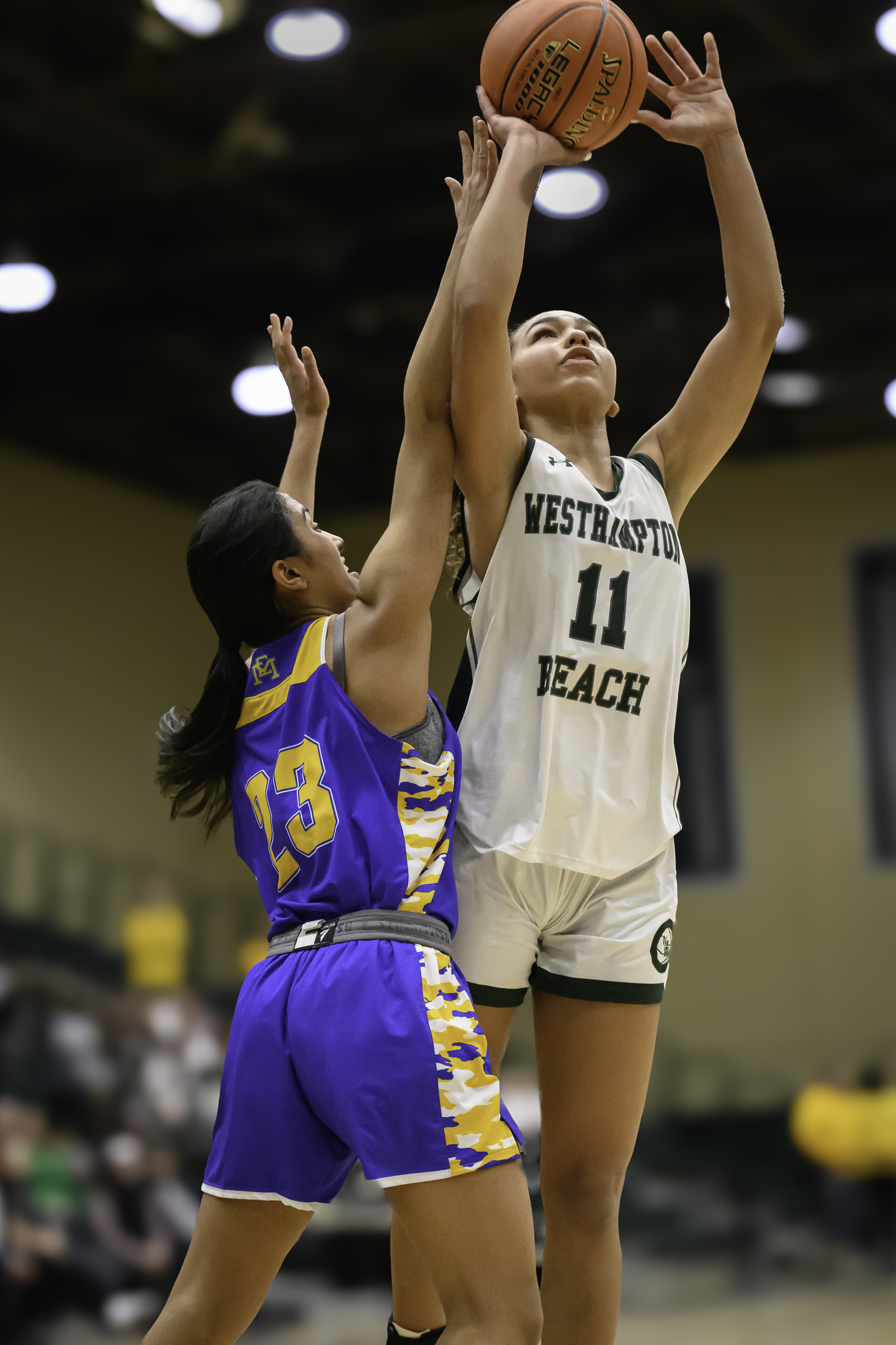 Sophomore center Jasmine Taylor hits a layup. MARIANNE BARNETT