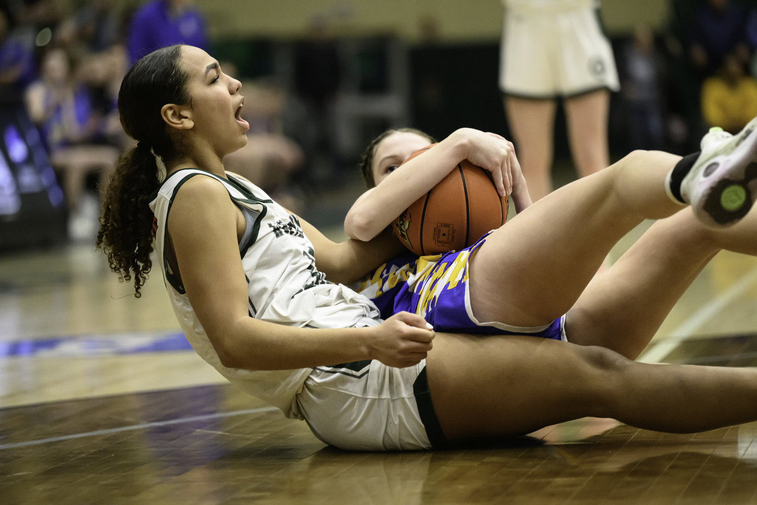 Sophomore center Jasmine Taylor battles for a jump ball. MARIANNE BARNETT