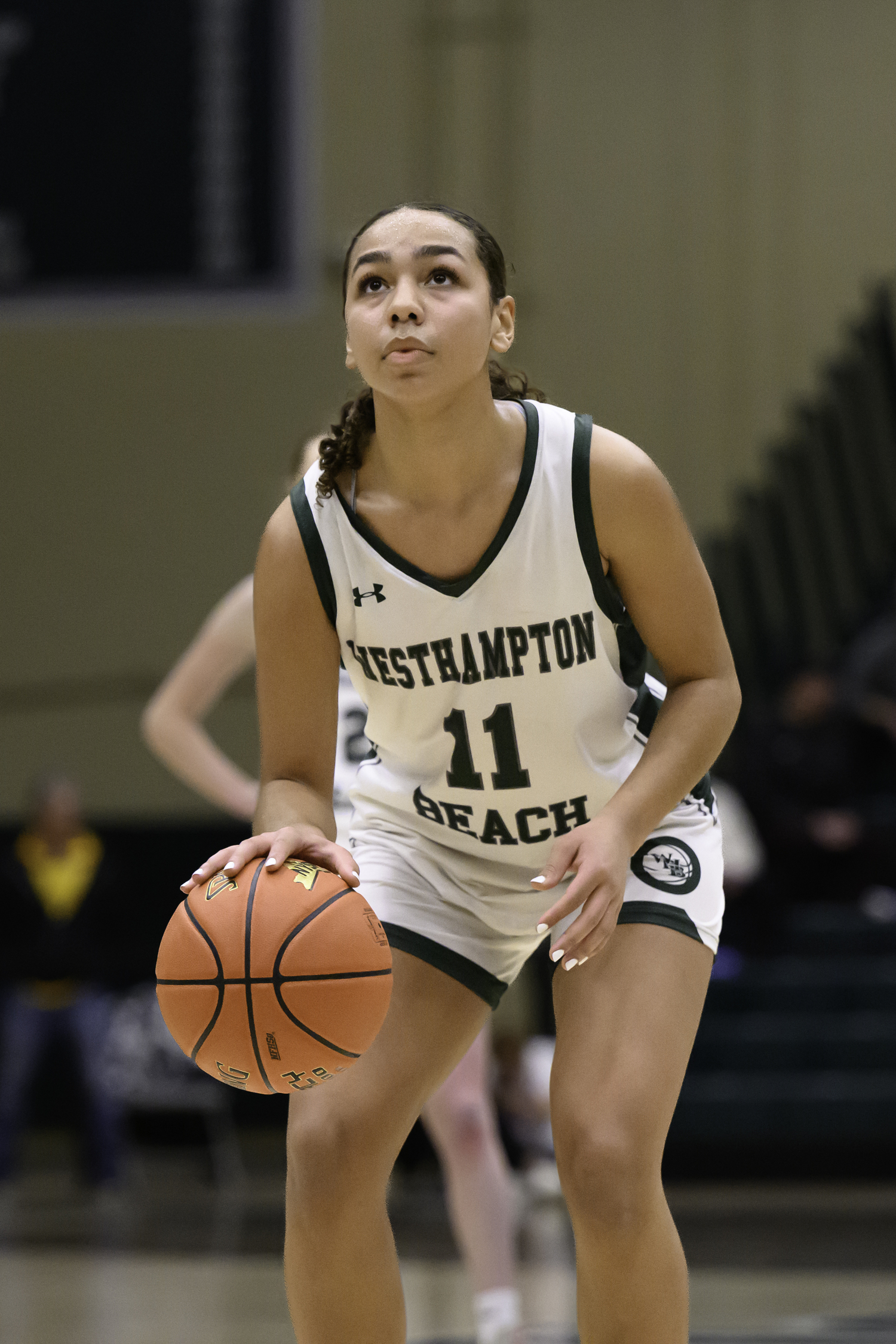 Sophomore center Jasmine Taylor steadies herself at the free-throw line. MARIANNE BARNETT