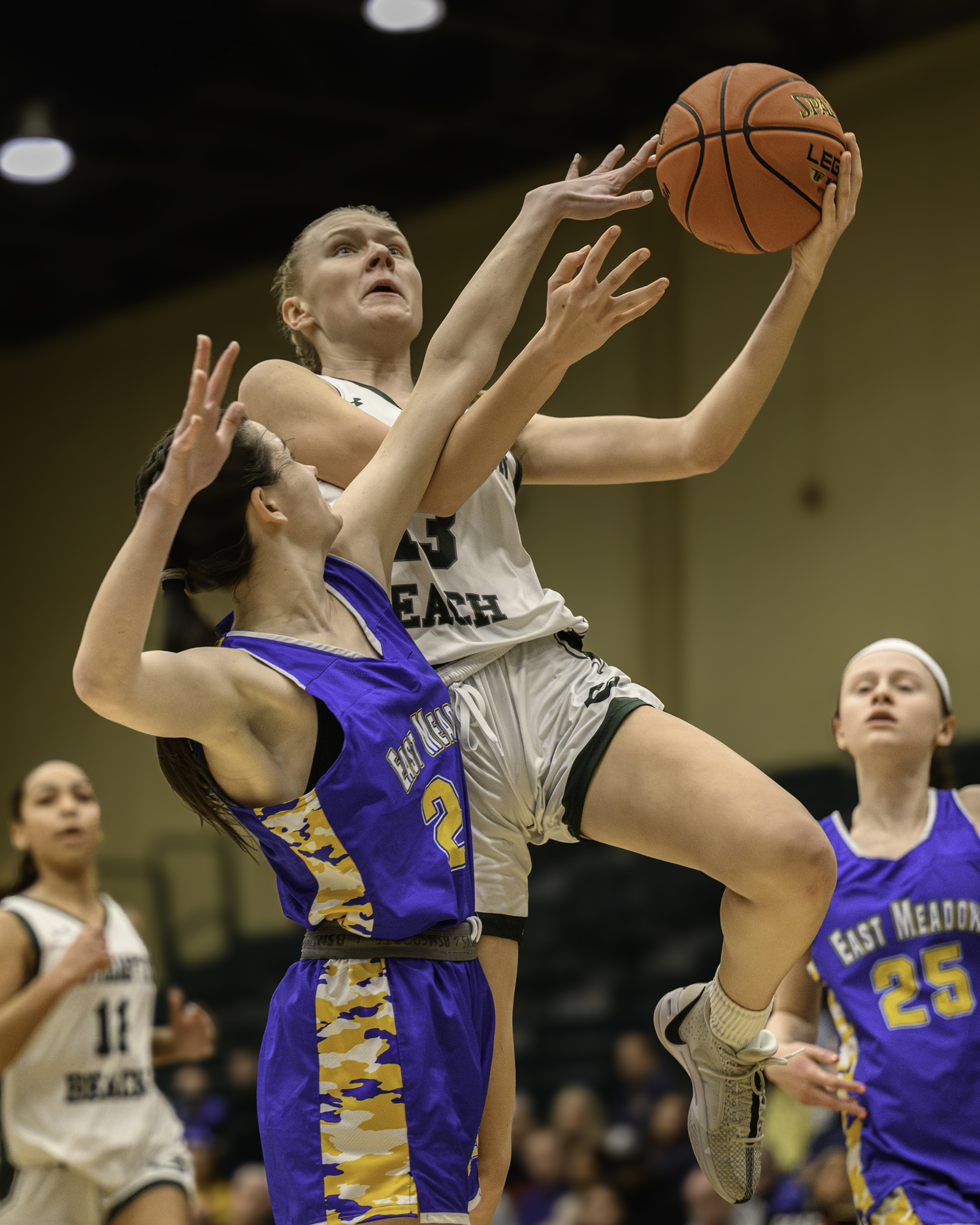 Freshman guard Kate Sweet goes up to the rim. MARIANNE BARNETT