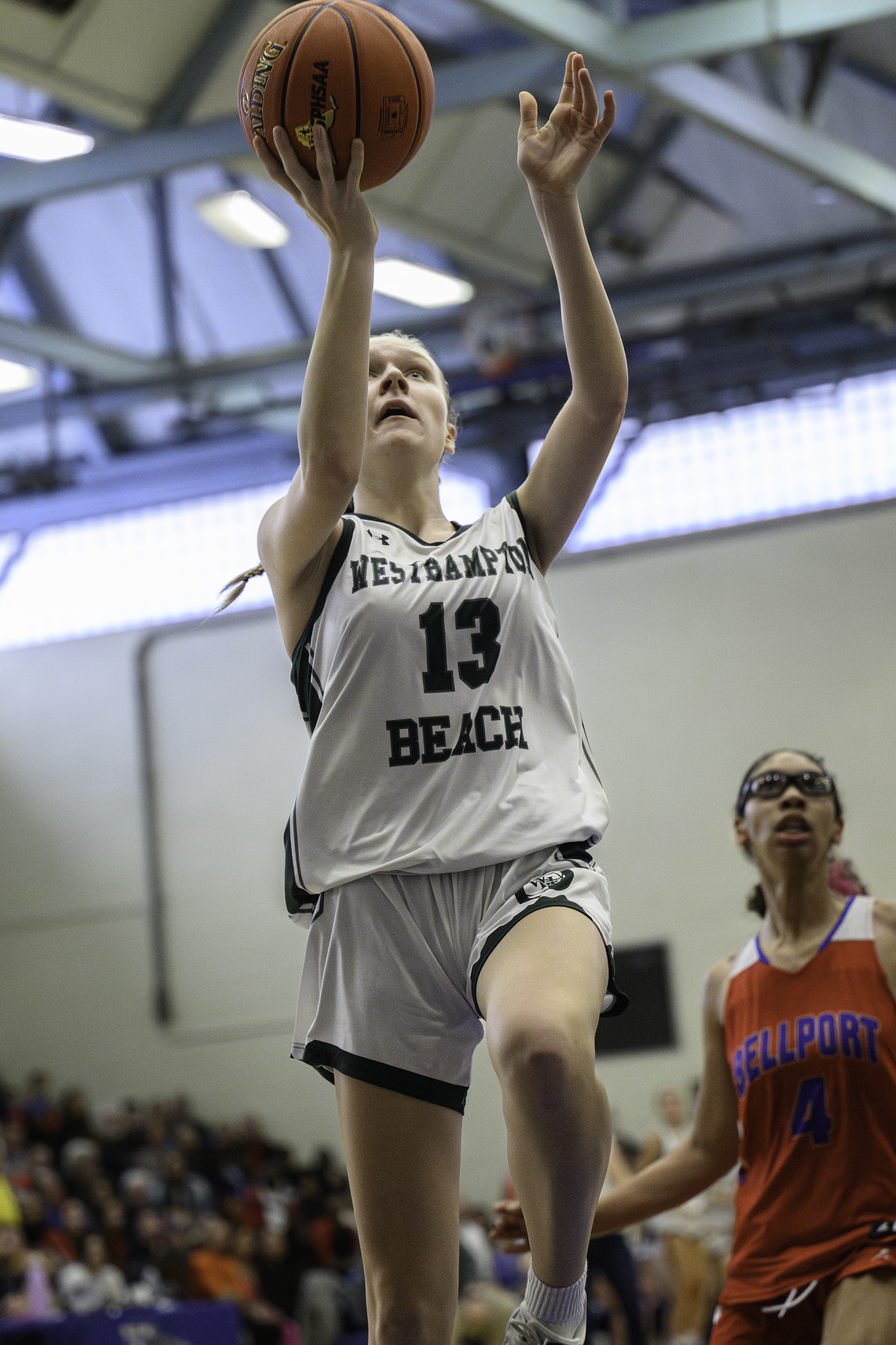 Westhampton Beach freshman guard Kate Sweet drives to the basket. MARIANNE BARNETT