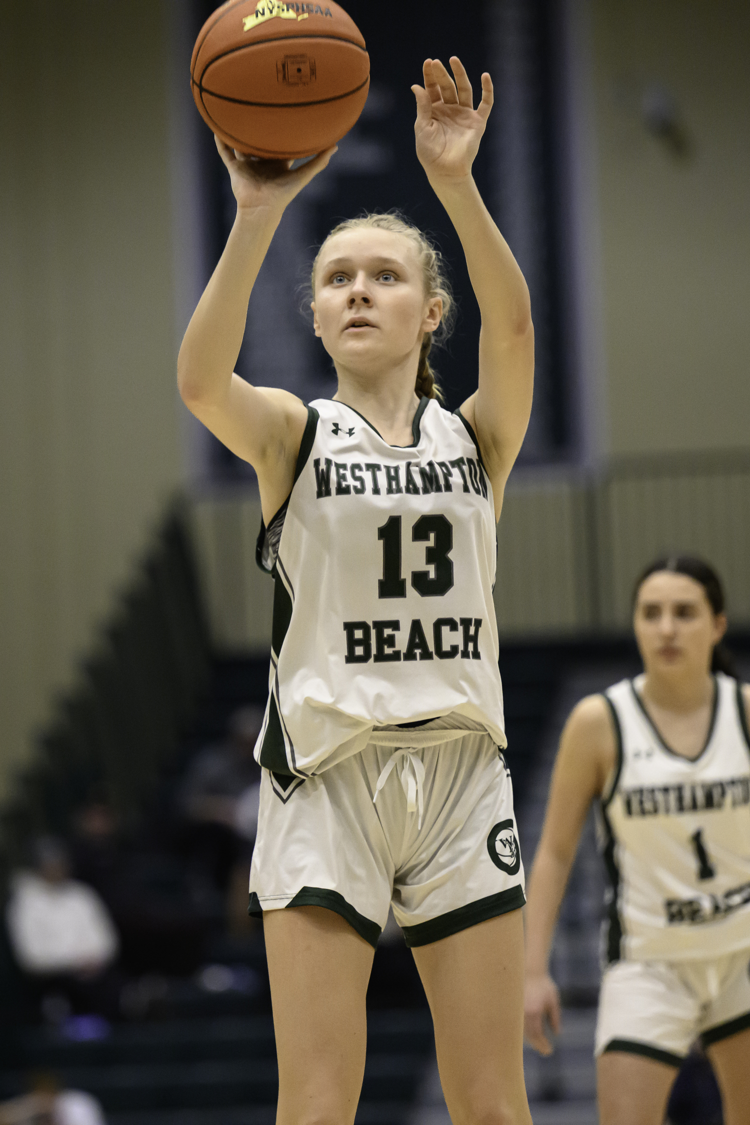 Freshman guard Kate Sweet shoots from the free-throw line. MARIANNE BARNETT