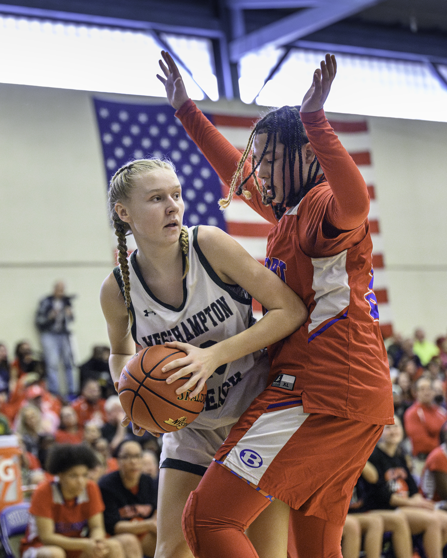 Westhampton Beach freshman guard Kate Sweet passes the ball around a defender. MARIANNE BARNETT