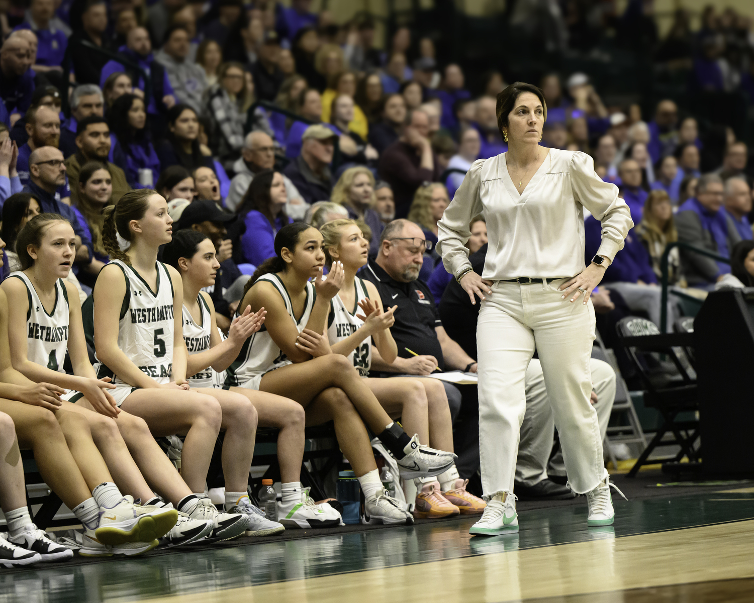 Head coach Katie Peters watches a play unfold. MARIANNE BARNETT