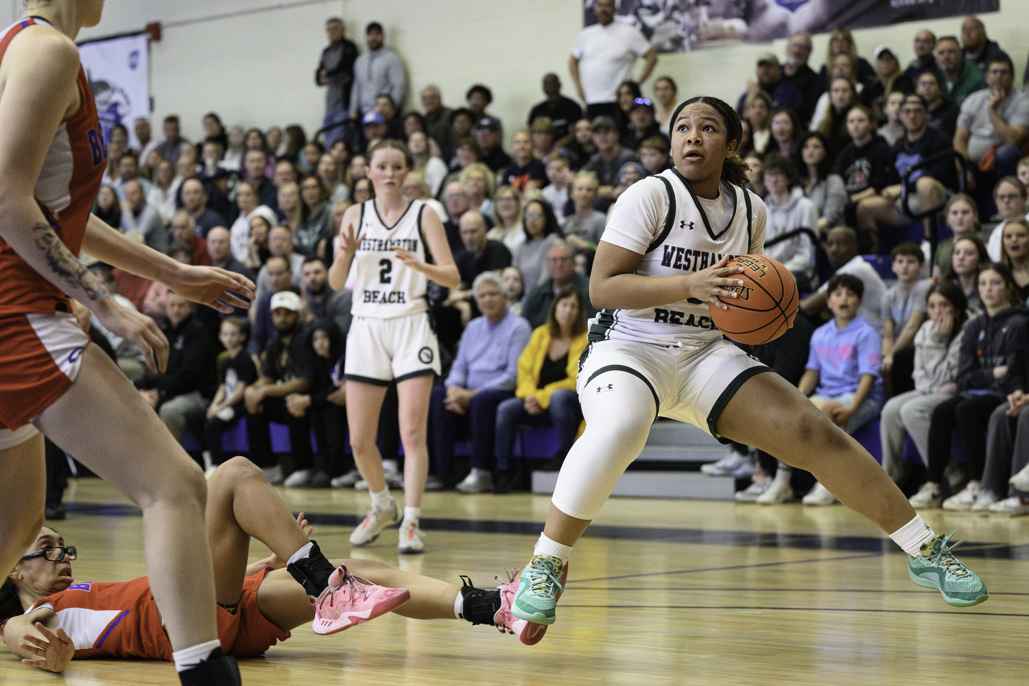 Westhampton Beach sophomore point guard Sandra Clarke bounces out for a clearer shot. MARIANNE BARNETT