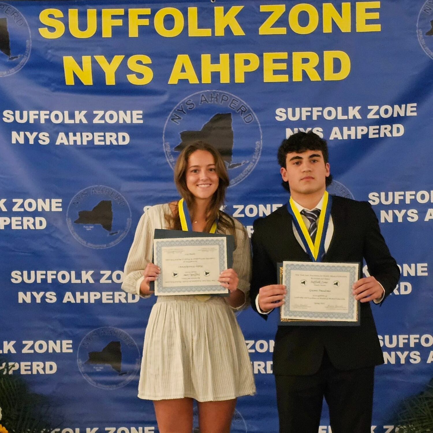 Westhampton Beach High School seniors Gianni Amodemo and Haley Waszkelewicz were honored by the New York State Association for Health, Physical Education, Recreation and Dance as winners of their school's Suffolk Zone Student Leadership Award. The two were selected based on their excellence in physical education, leadership ability and service to the community. COURTESY WESTHAMPTON BEACH SCHOOL DISTRICT