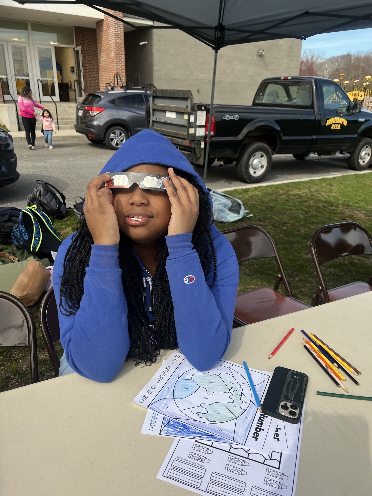 Bridgehampton Union Free School District and community members gathered for a showing of the solar eclipse on April 8. With the protection of eclipse glasses, everyone was able to witness the incredible event. Student Nickoya Patterson is ready. COURTESY BRIDGEHAMPTON SCHOOL DISTRICT