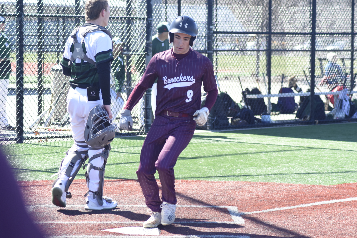 Justin Prince scores as part of a big fifth inning for the Bonac offense on Saturday.   DREW BUDD