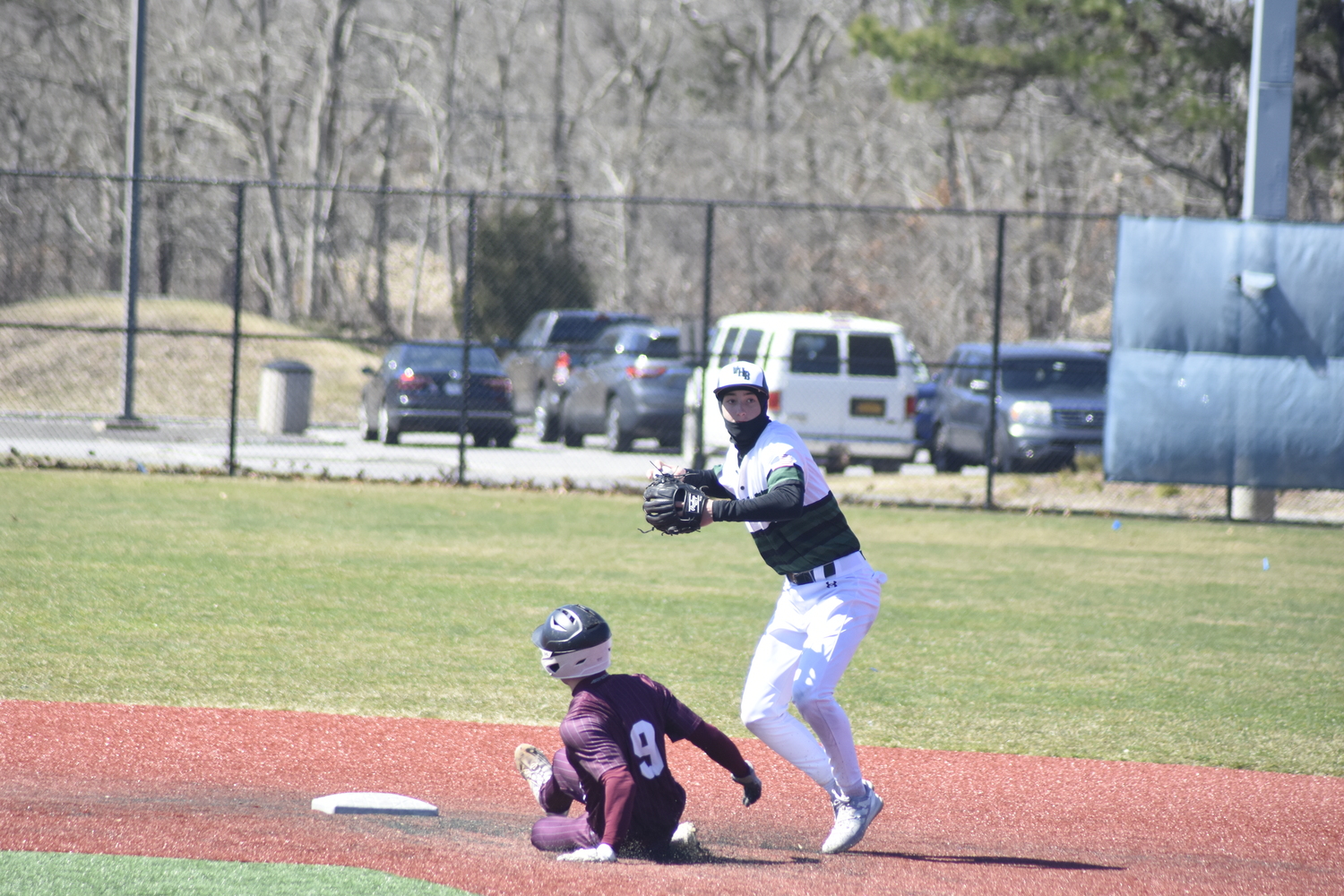 Patrick Fay turns the back end of a double play at second base.  DREW BUDD