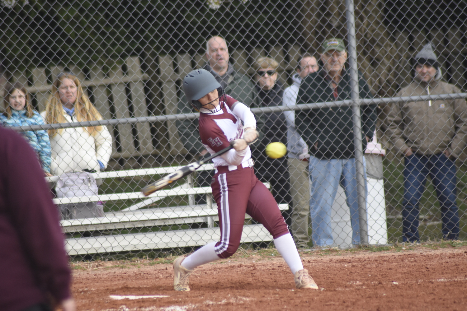 East Hampton sophomore Brynley Lys has a pitch lined up in her sights. DREW BUDD