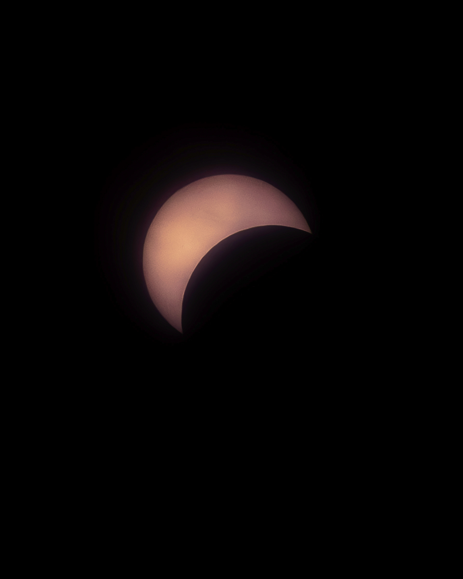 The moon partially covers the sun during Monday's eclipse.