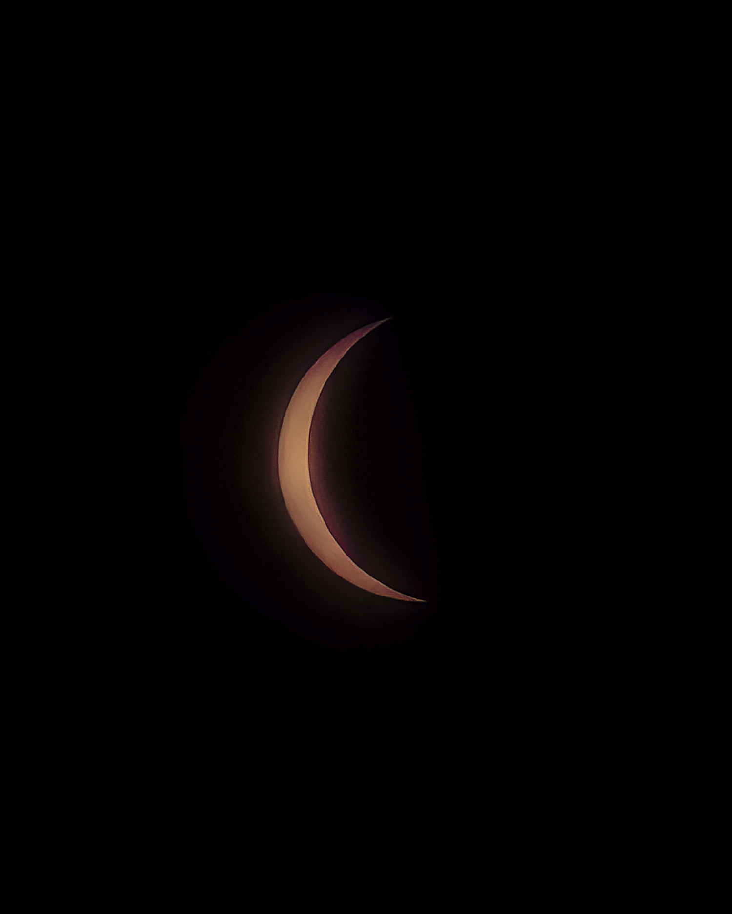 A sliver of the sun pokes out behind the moon during Monday' eclipse.