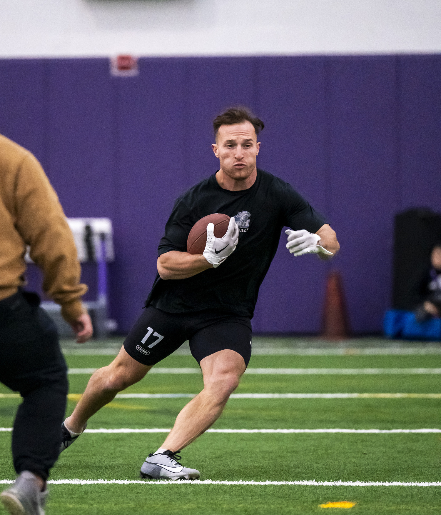 Westhampton Beach and soon-to-be University of New Hampshire graduate Dylan Laube performs drills during College of the Holy Cross's annual NFL Pro Day March 21. UNH Athletics/Patrick Donnelly