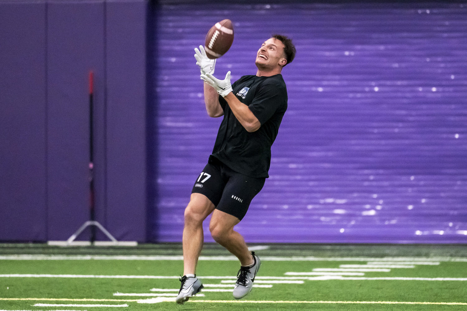 Westhampton Beach and soon-to-be University of New Hampshire graduate Dylan Laube performs drills during College of the Holy Cross's annual NFL Pro Day March 21. UNH Athletics/Patrick Donnelly