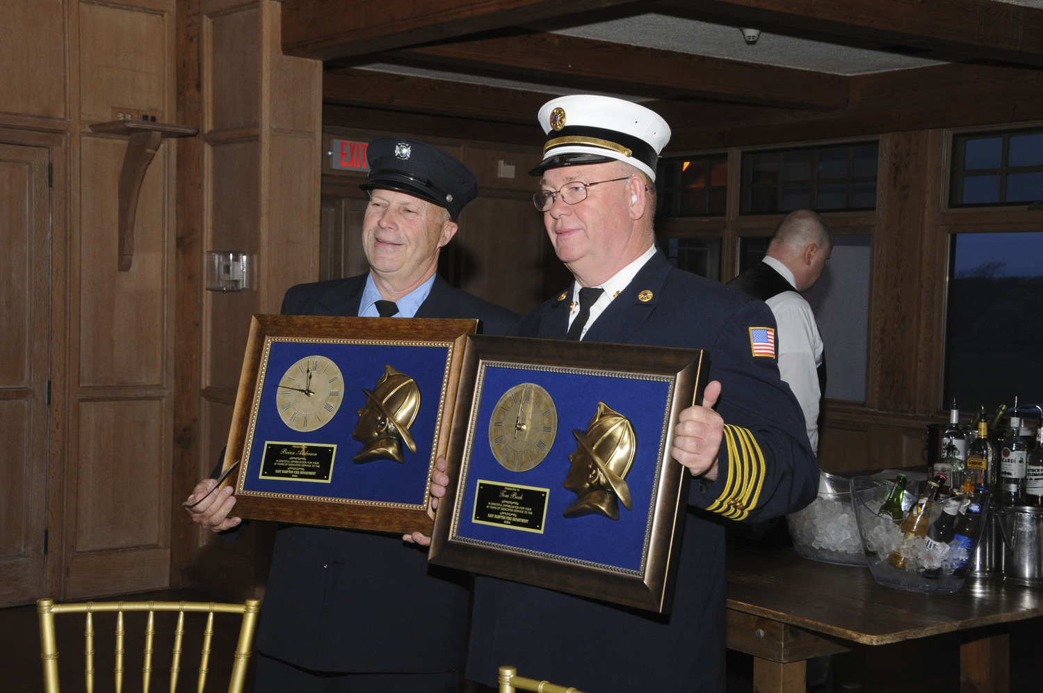 Thomas Bock and Brian Anderson, 40 Year members at the East Hampton Fire Department's 125th Annual Inspection Dinner at the Maidstone Club on Saturday.  RICHARD LEWIN