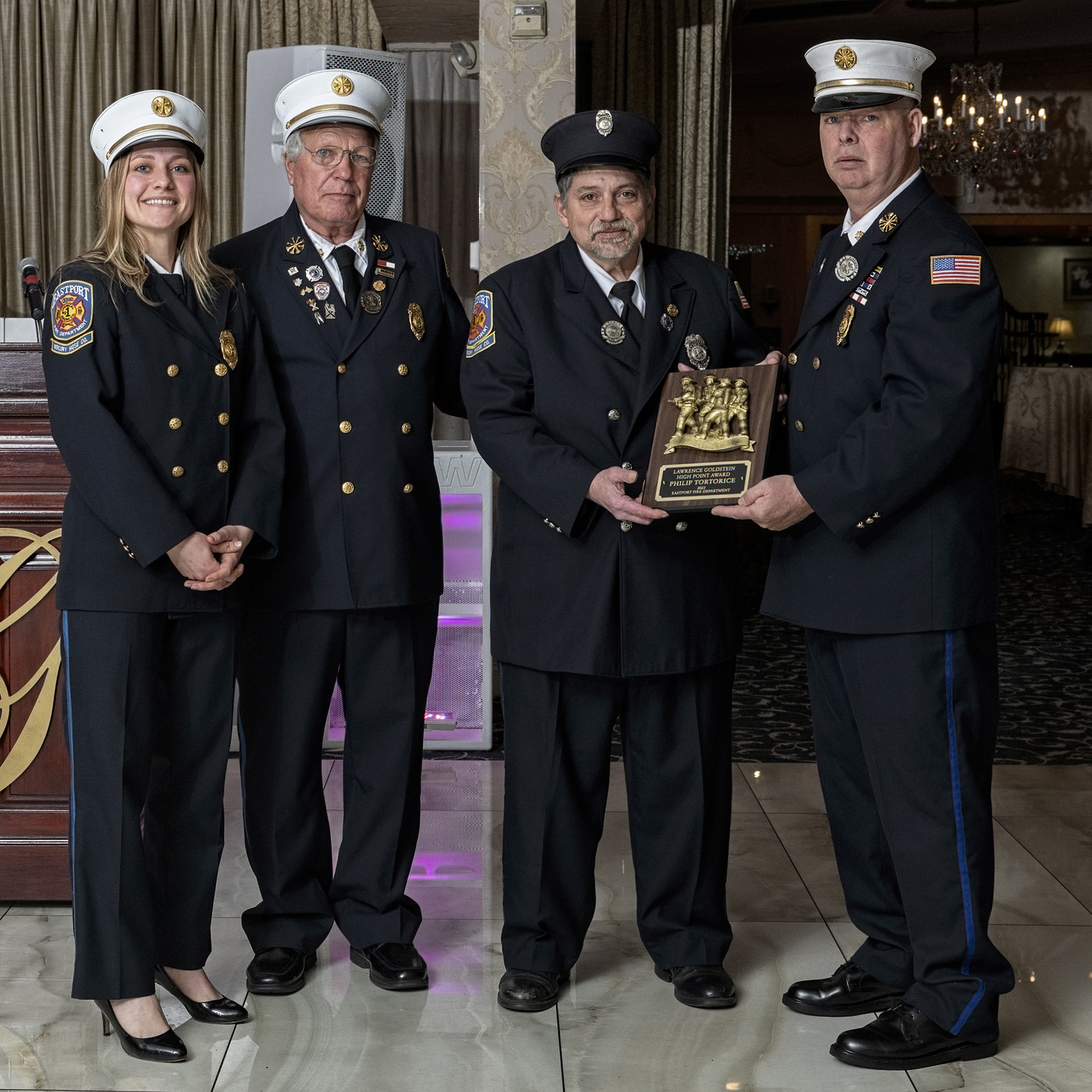 Philip Tortorice, third from left, received the Lawrence Goldstein High Point Award at the Eastport Fire Department's 2024 Installation Dinner at Georgio’s in Calverton on April 13.  With him are, from  left, Second Assistant Chief Virginia Massey, First Assistant Chief Steven Schaefer, and Chief John Dalen.  COURTESY EASTPORT FIRE DEPARTMENT