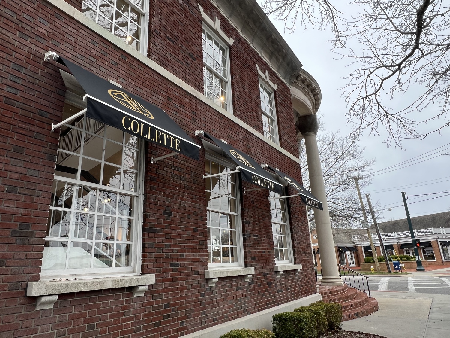 The Southampton Village Architectural Review & Historic Preservation Board says the awnings at 1 Hampton Road are against village code because graphics on the top of an awning are prohibited. DANA SHAW