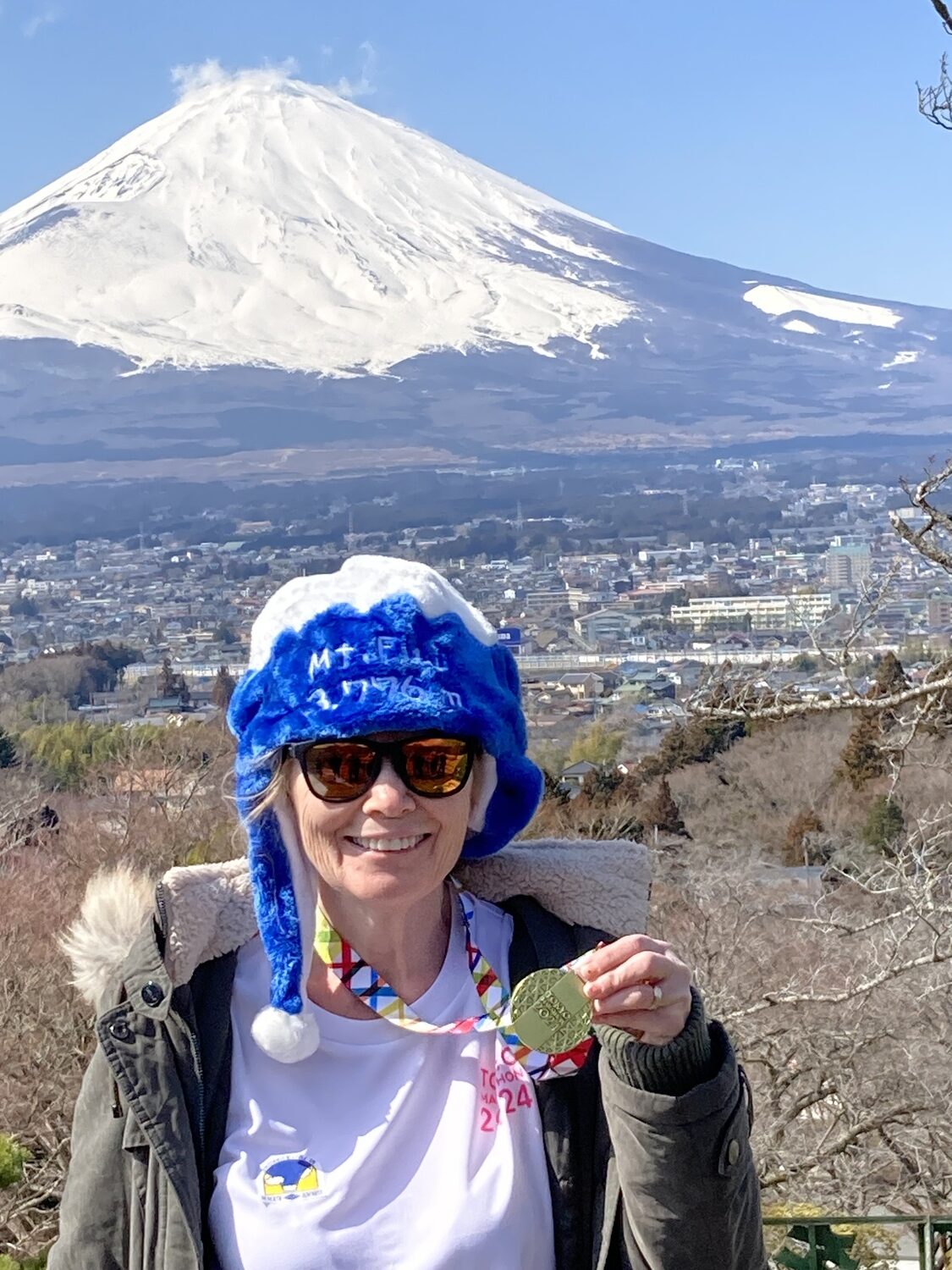 Gail Miranda with Mount Fiji in Japan in the background.   COURTESY GAIL MIRANDA