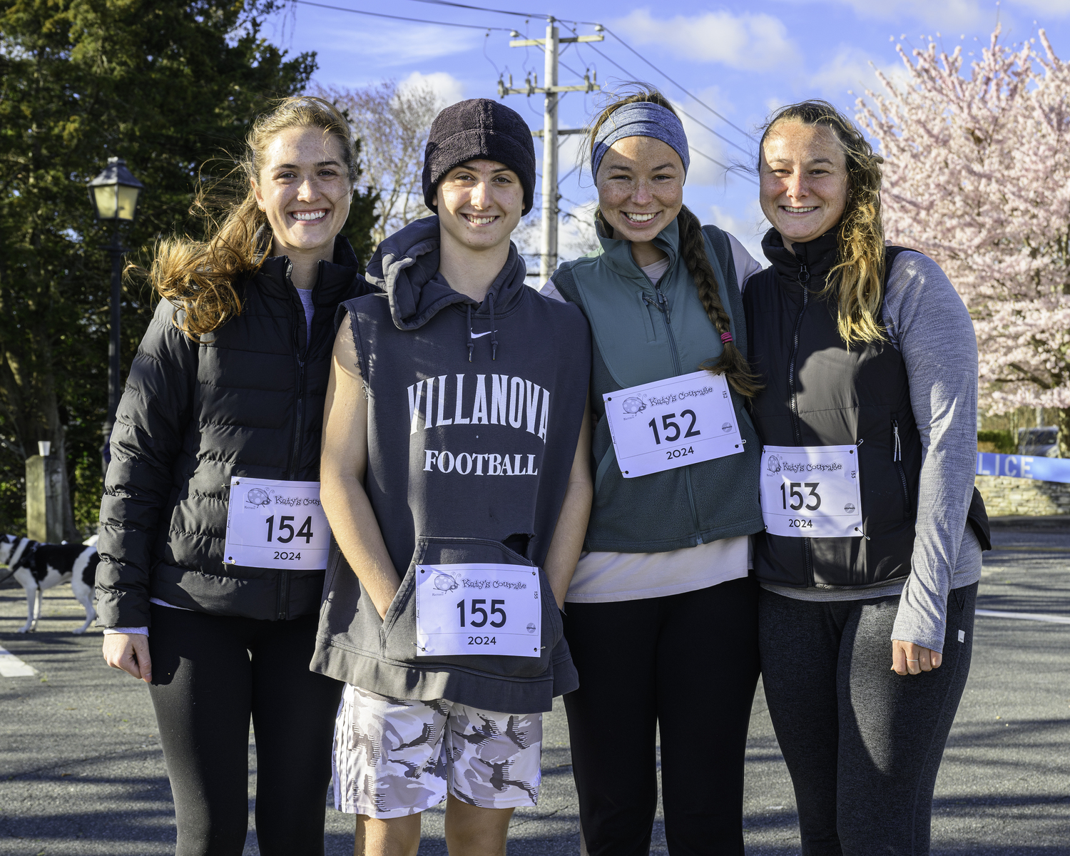 The Hinchen Family, from left, Ally, Eli, Grace and Jodi, just prior to the start of Saturday morning's race in Sag Harbor.   MARIANNE BARNETT