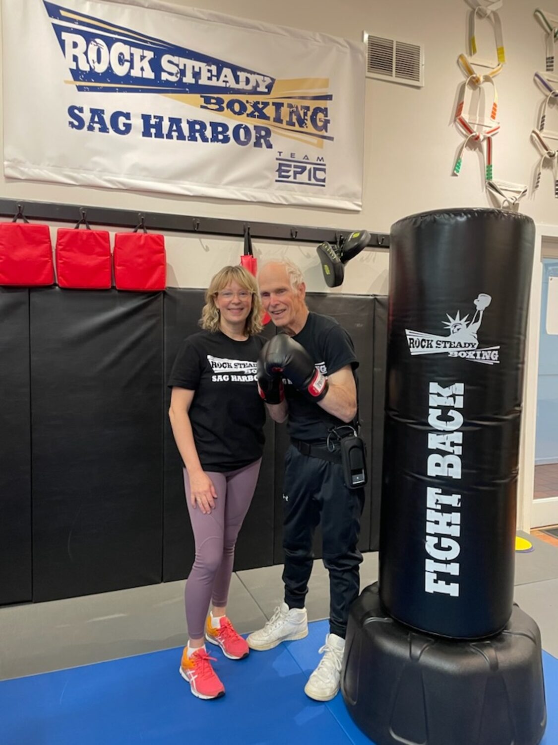 Kristin Davey, a volunteer with Rock Steady Boxing in Sag Harbor, and her father, Kelly King, who has participated in the program since its inception in 2017. MICHELLE DEL GIORNO