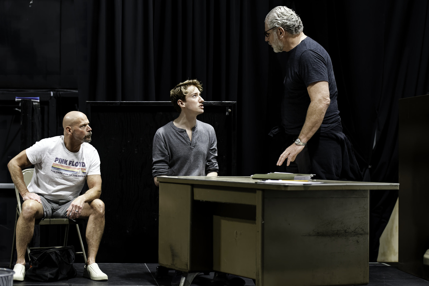 Joe Pallister (as Ariel), John Kroft (as Katurian), and, in foreground, Edward Kassar (as Tupolski) during rehearsals of Martin McDonagh's 