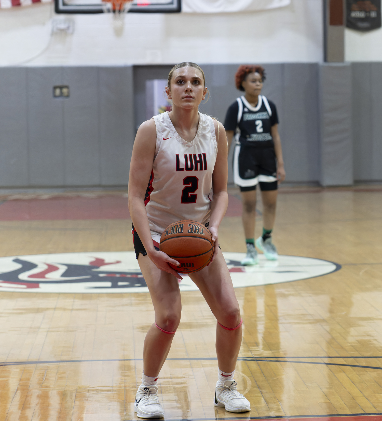 Sag Harbor resident Coco Lohmiller in action with the LuHi girls basketball team, which has been the top-ranked team in the nation for most of the season. M. FIDEL PHOTOGRAPHY