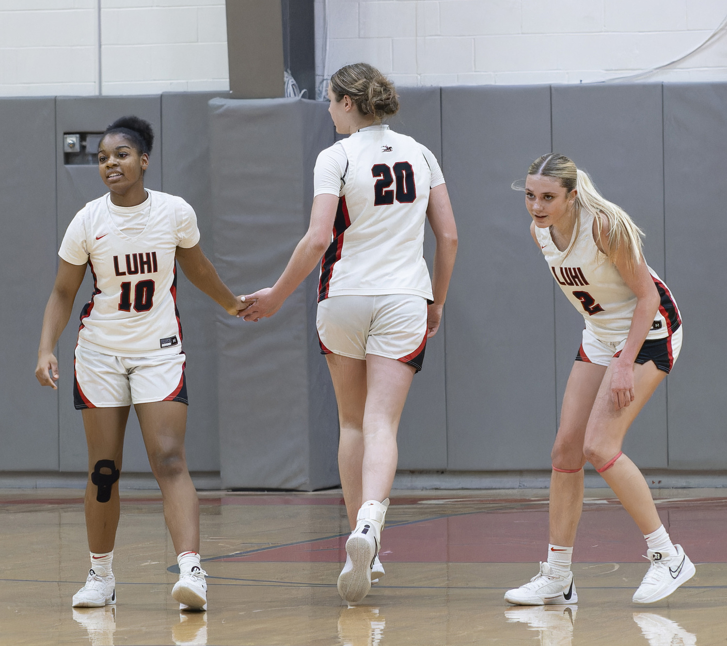 Sag Harbor resident Coco Lohmiller (#2) in action with the LuHi girls basketball team, which has been the top-ranked team in the nation for most of the season. M. FIDEL PHOTOGRAPHY