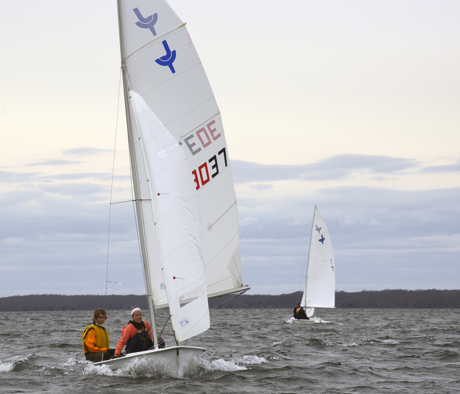 Derrick Galen with crewmember Amelia Steelman broad reaching to the leeward mark.   MICHAEL MELLA