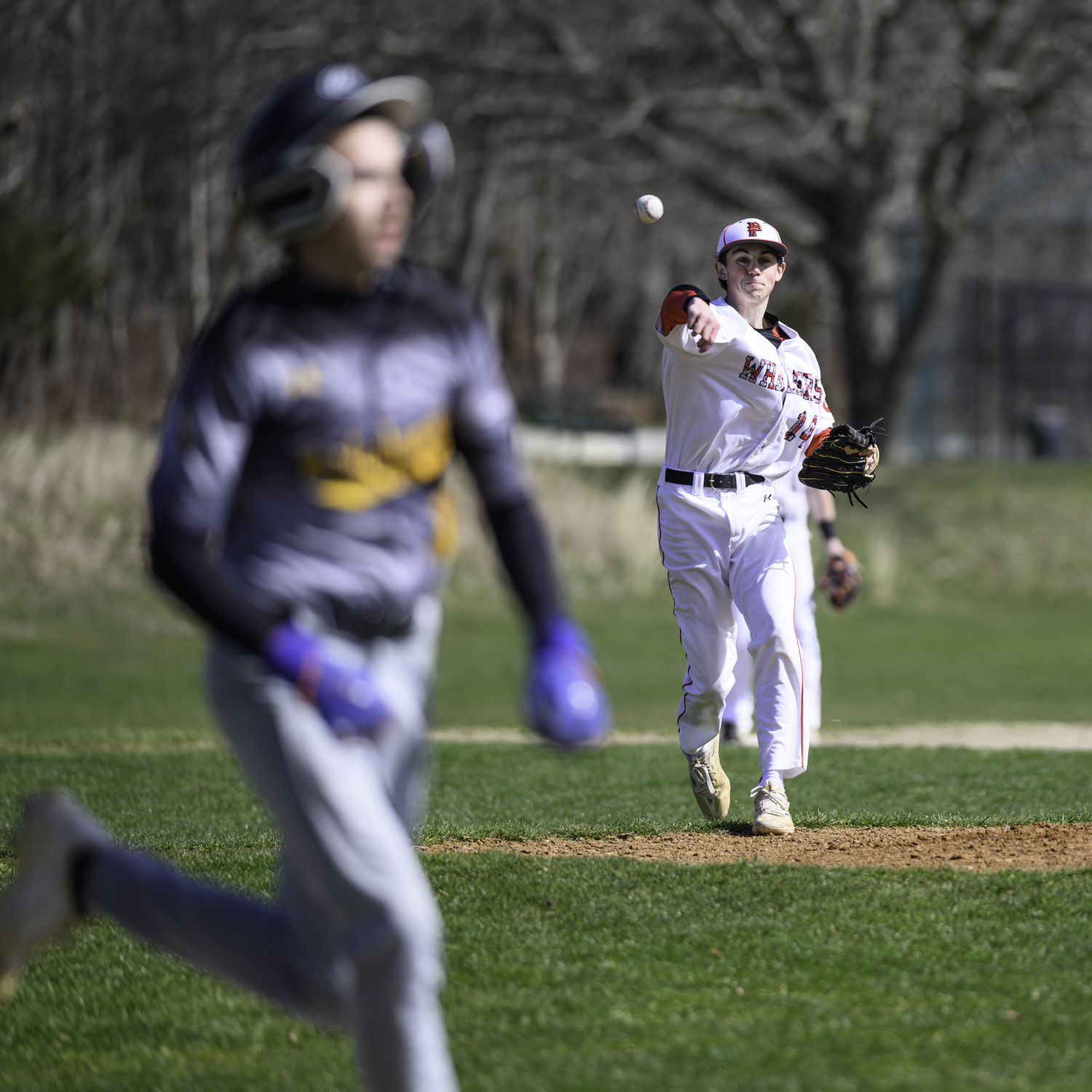 Braeden Mott throws to first base to get an out.   MARIANNE BARNETT