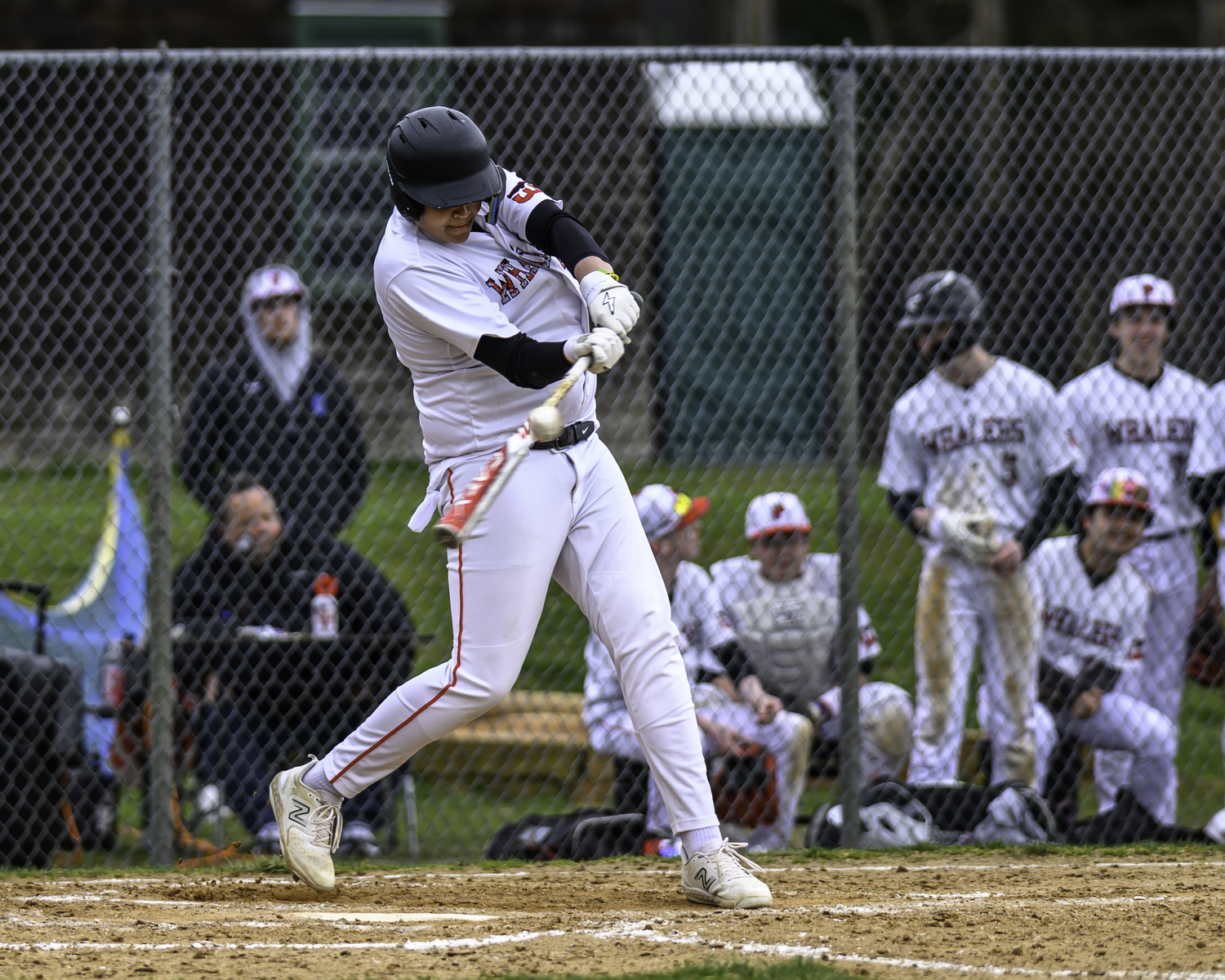 Paul Roesel's base hit in the second inning brought home a pair of runs as part of the Whalers' four-run inning.   MARIANNE BARNETT