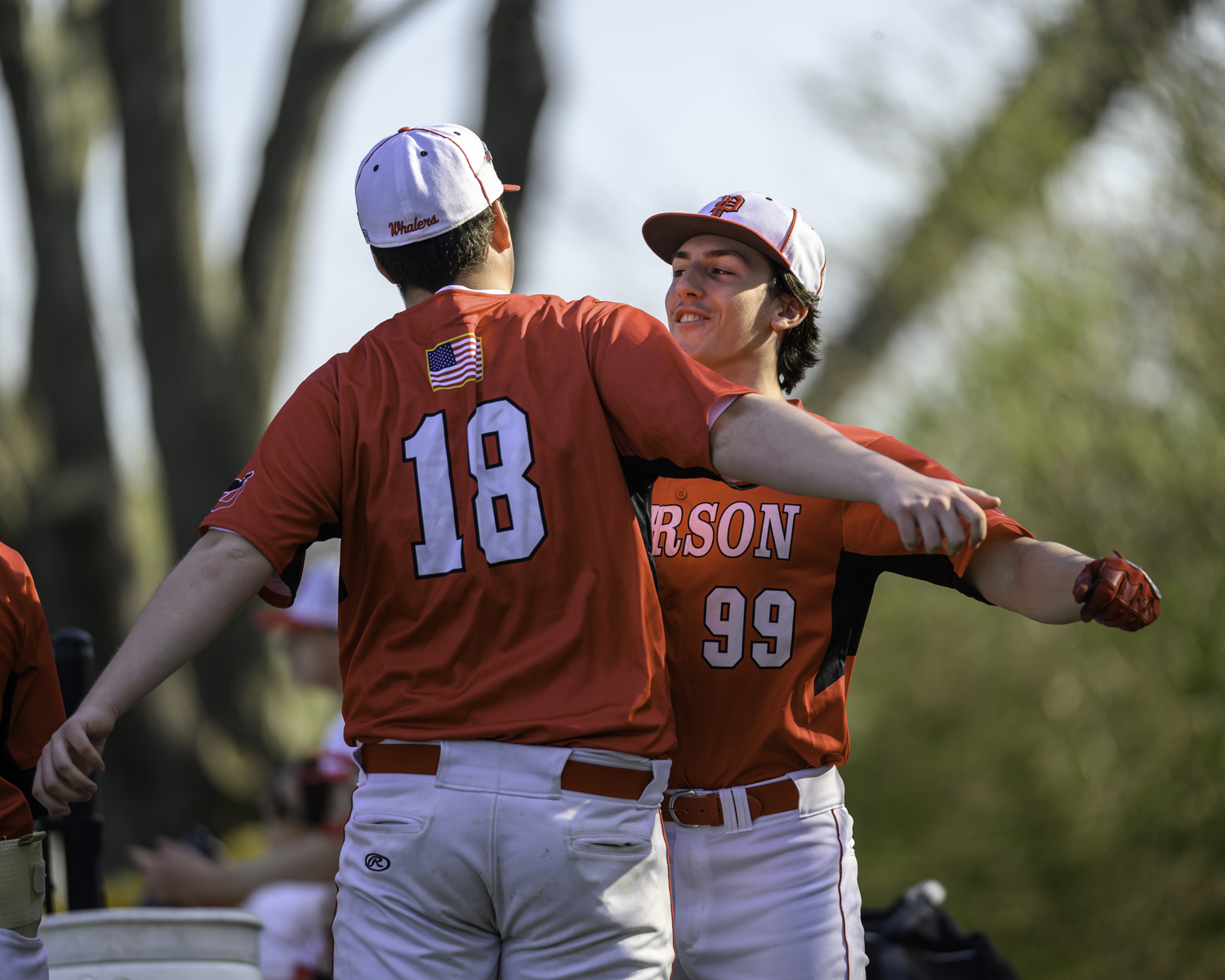 Paul Roesel, left, and Lucas Iulo are happy Whalers during their six-run seventh inning.  MARIANNE BARNETT